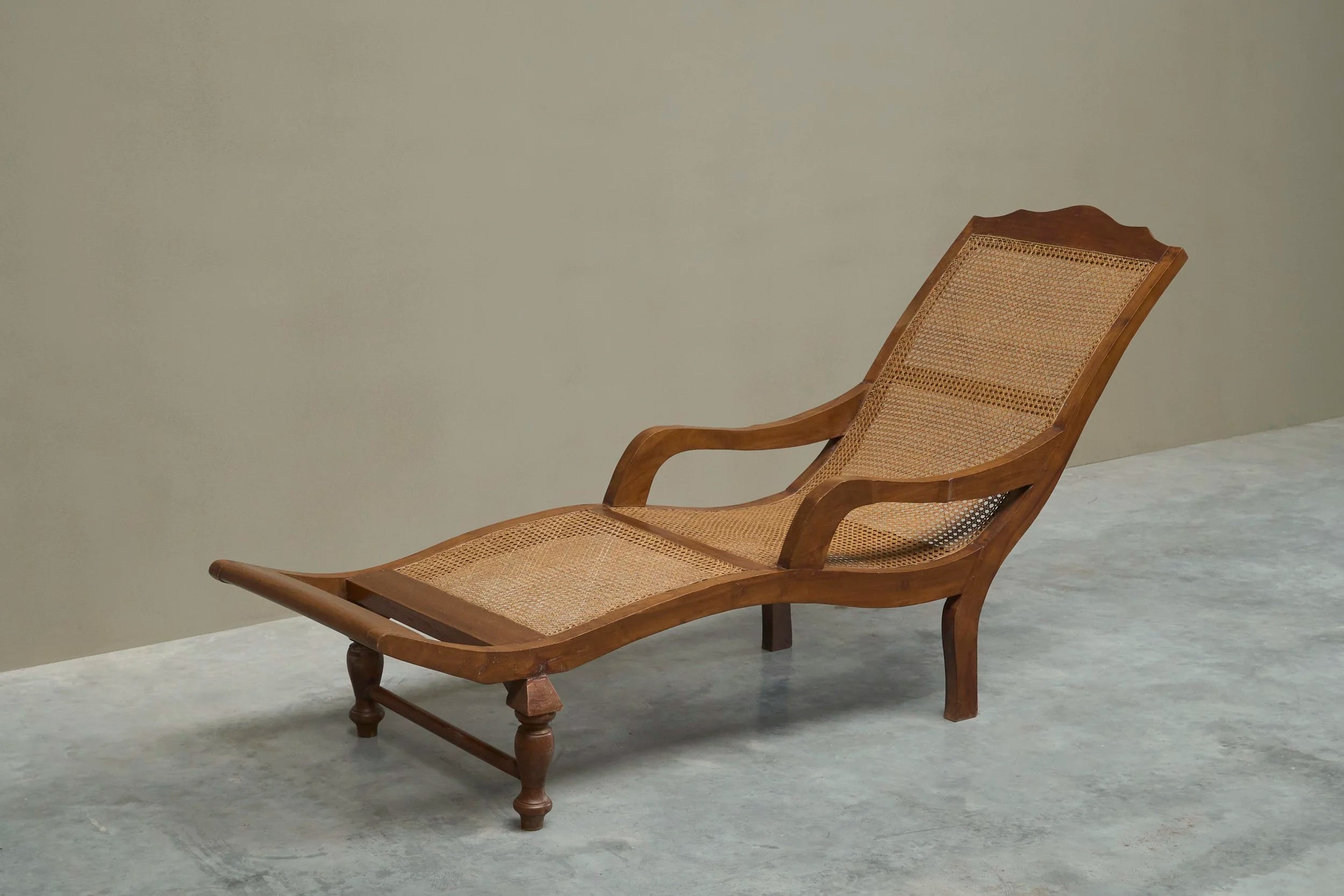 Sculptural Colonial Chaise Longue in Wood and Hand-Woven Cane, 1920s — side angle