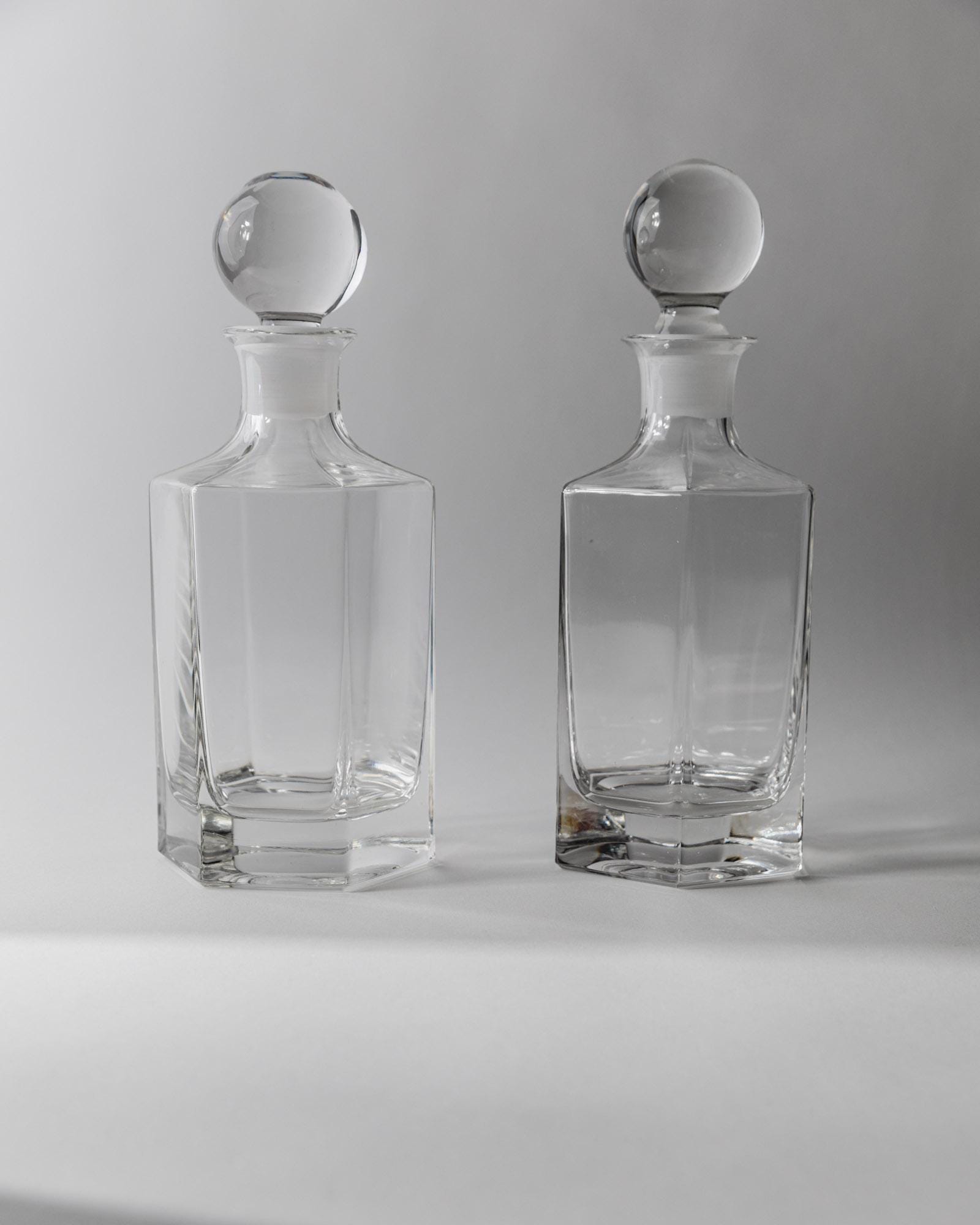 1970s Glass Decanter Set of 2 — front view on gray background