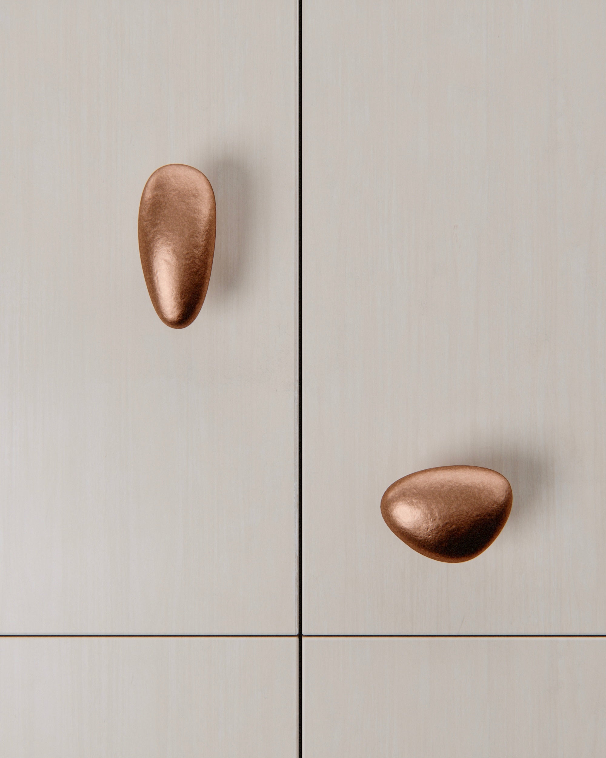 MOMI Cabinet Knob/Wall Hook Short — close-up of copper finish on cabinet doors