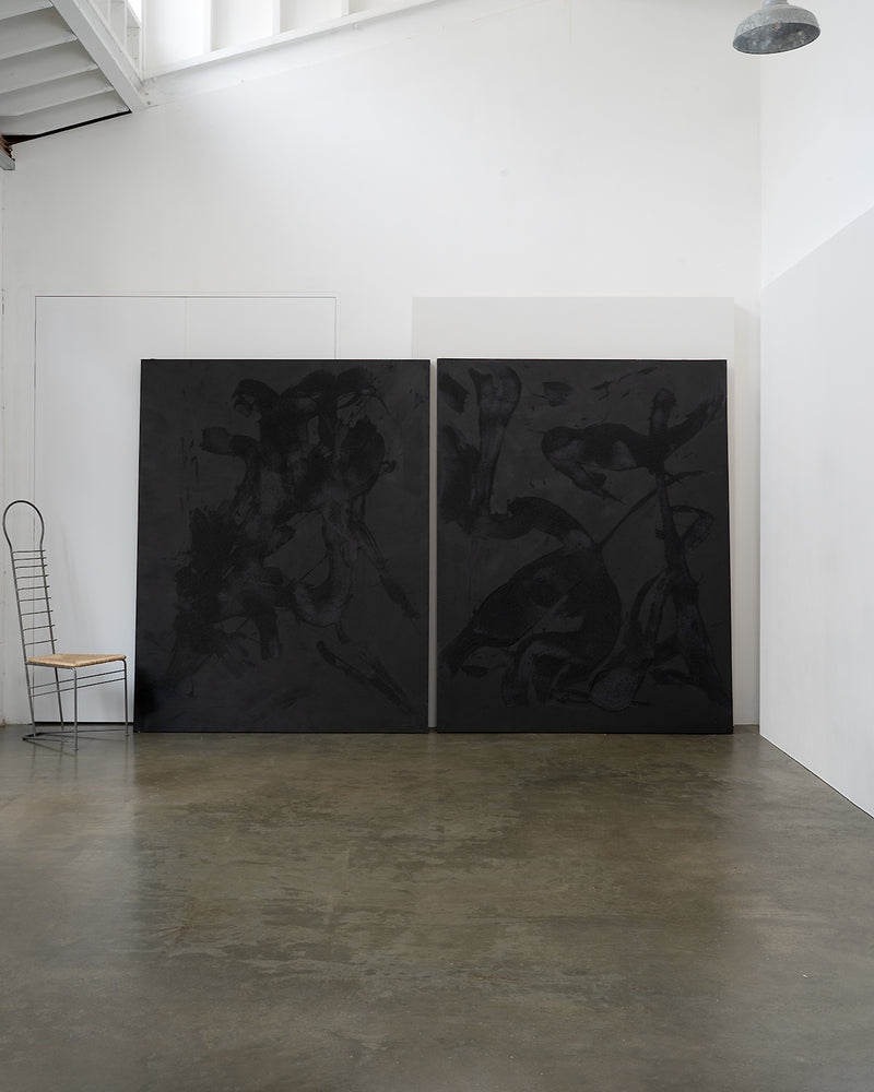 Large abstract diptych painting with dark gestural brushstrokes