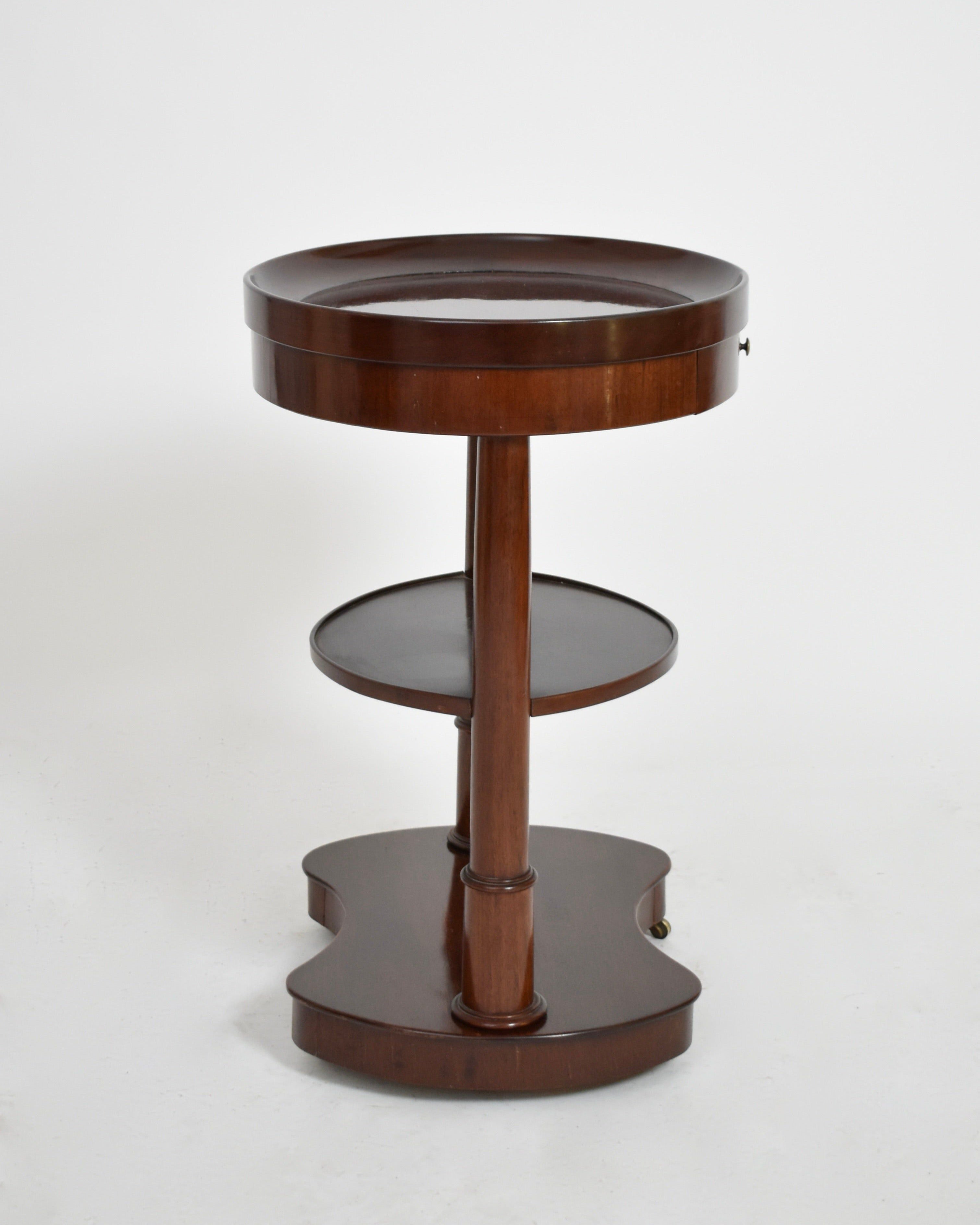 Pair of Mahogany Kidney Ovale Tables, XIXth c. — side angle showing round top and lower shelf