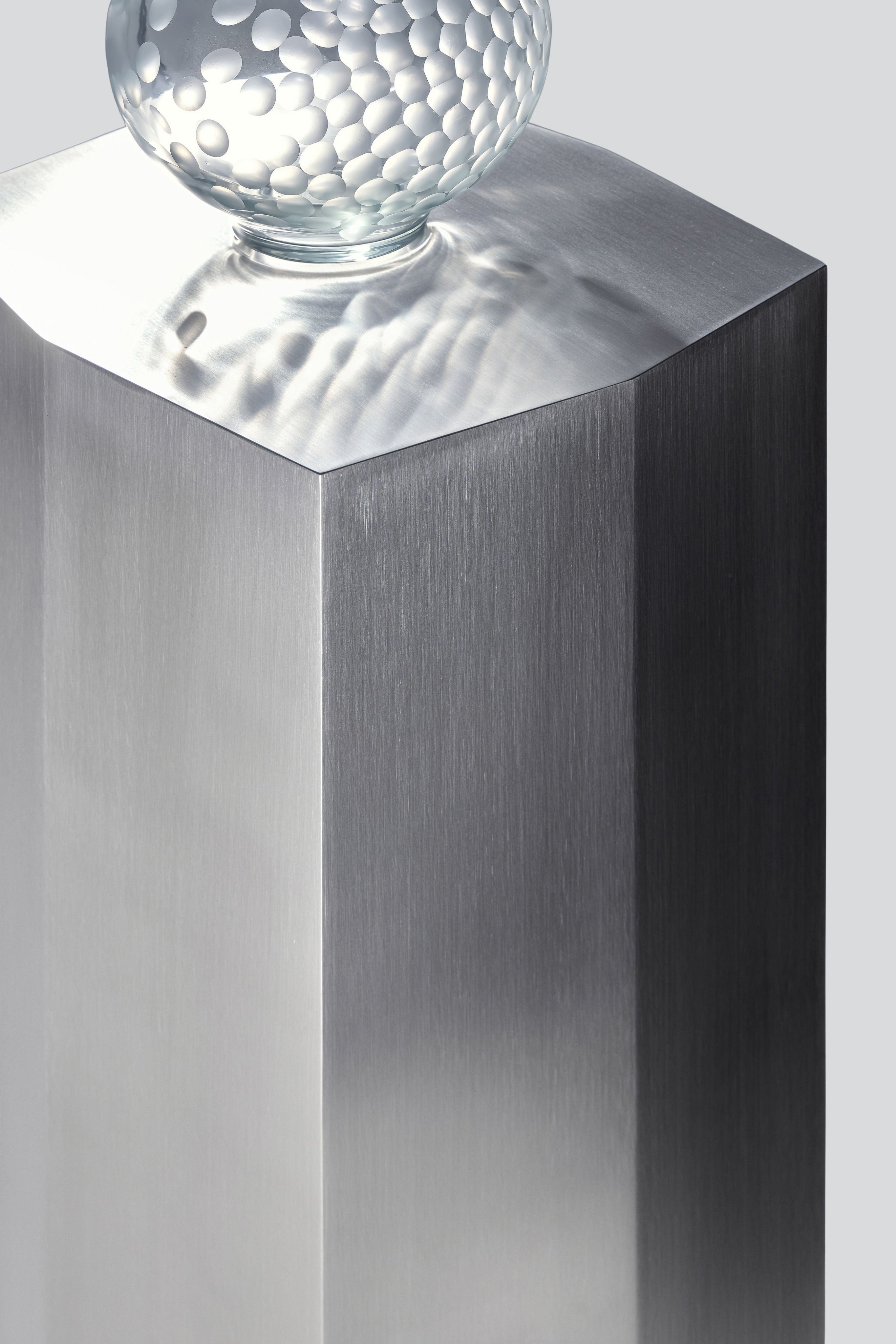 Ame II' Steel Pedestal — top view of brushed steel surface