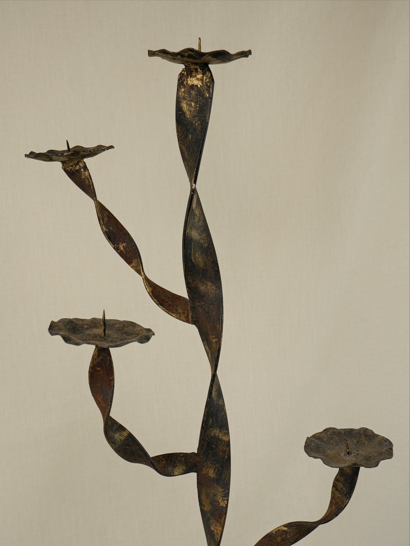 Pair of Gold-Patinated Iron Candlesticks — side angle