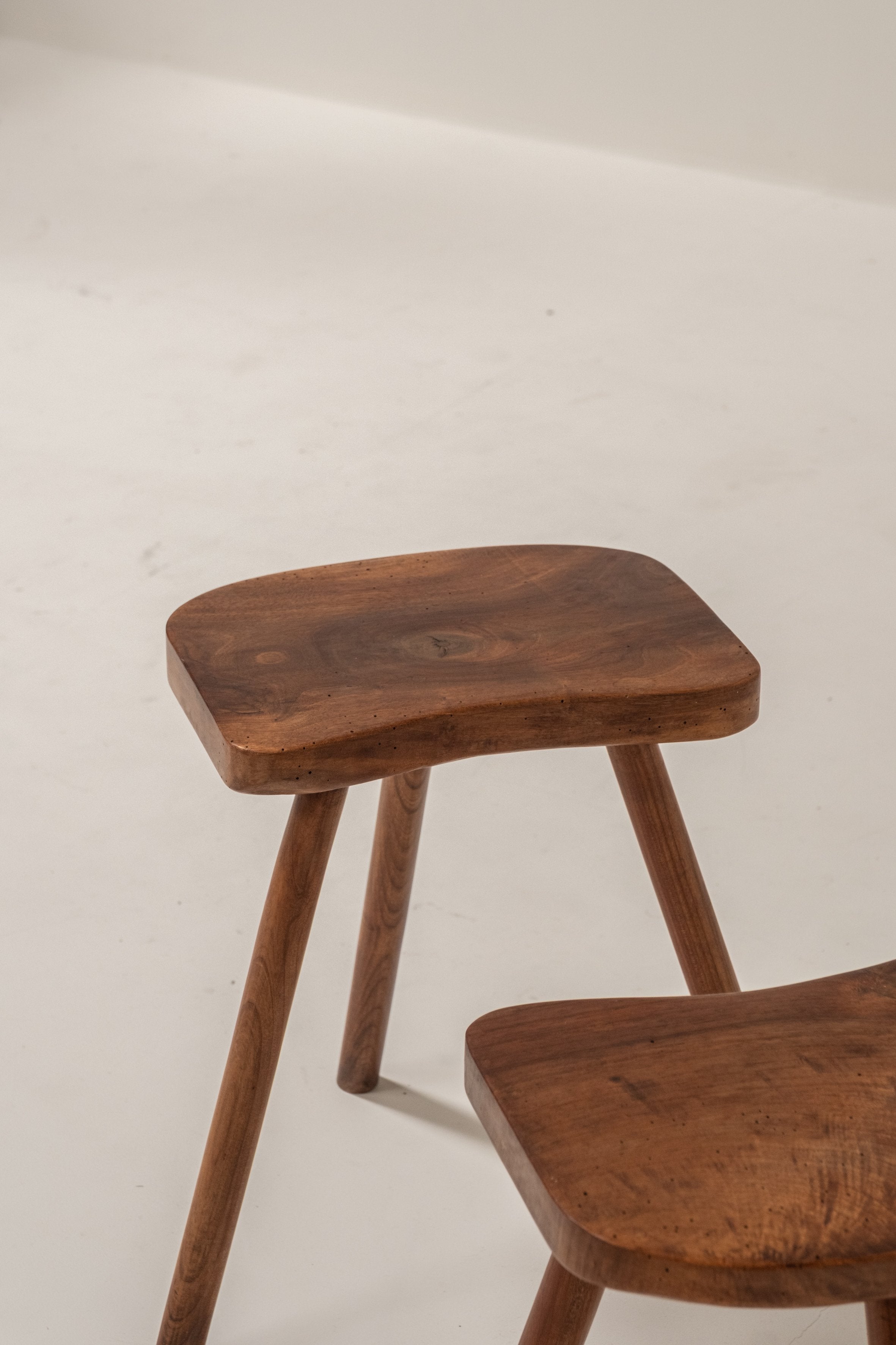 Pair of French Wooden Stools, 1950s — side angle