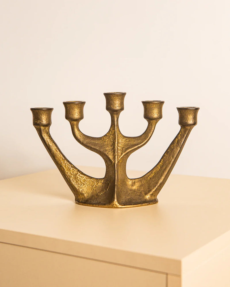 Golden brass five-branch candelabra with curved arms, Italian 1960s