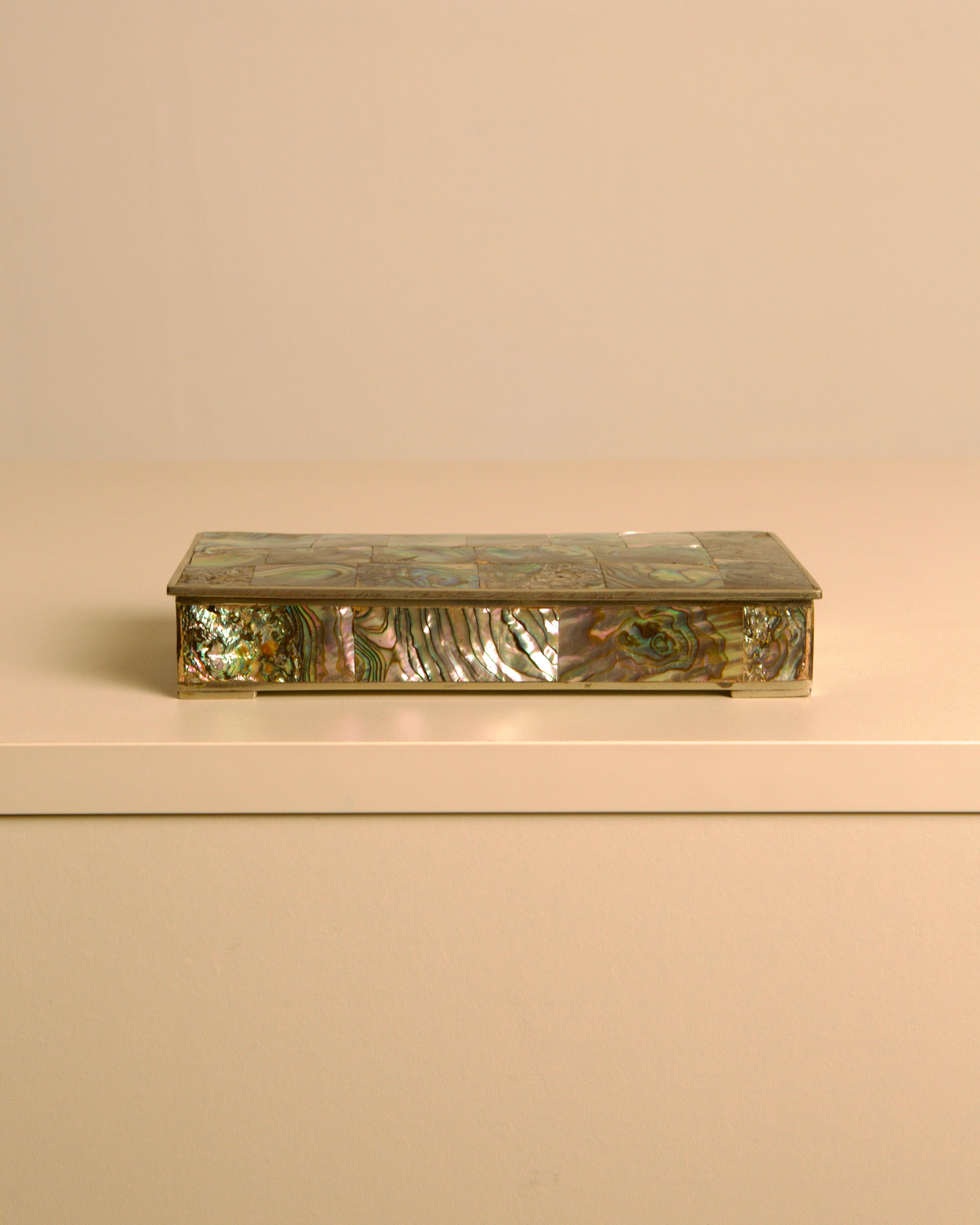Italian Rectangular Silver and Mother-of-pearl Inlaid Box 40s — side angle showing iridescent mother-of-pearl surface