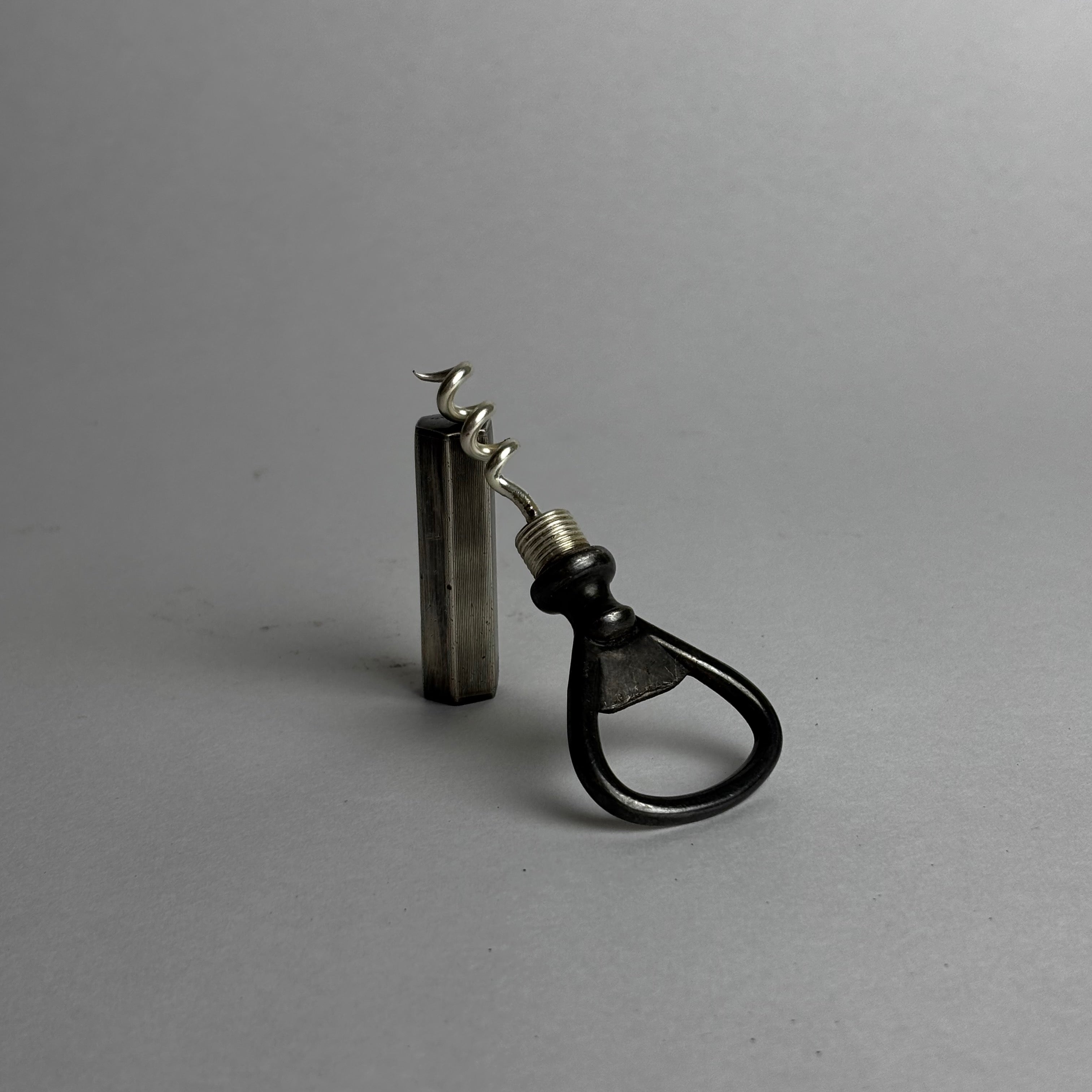 Sterling Silver Cork Screw and Bottle Opener — lifestyle setting