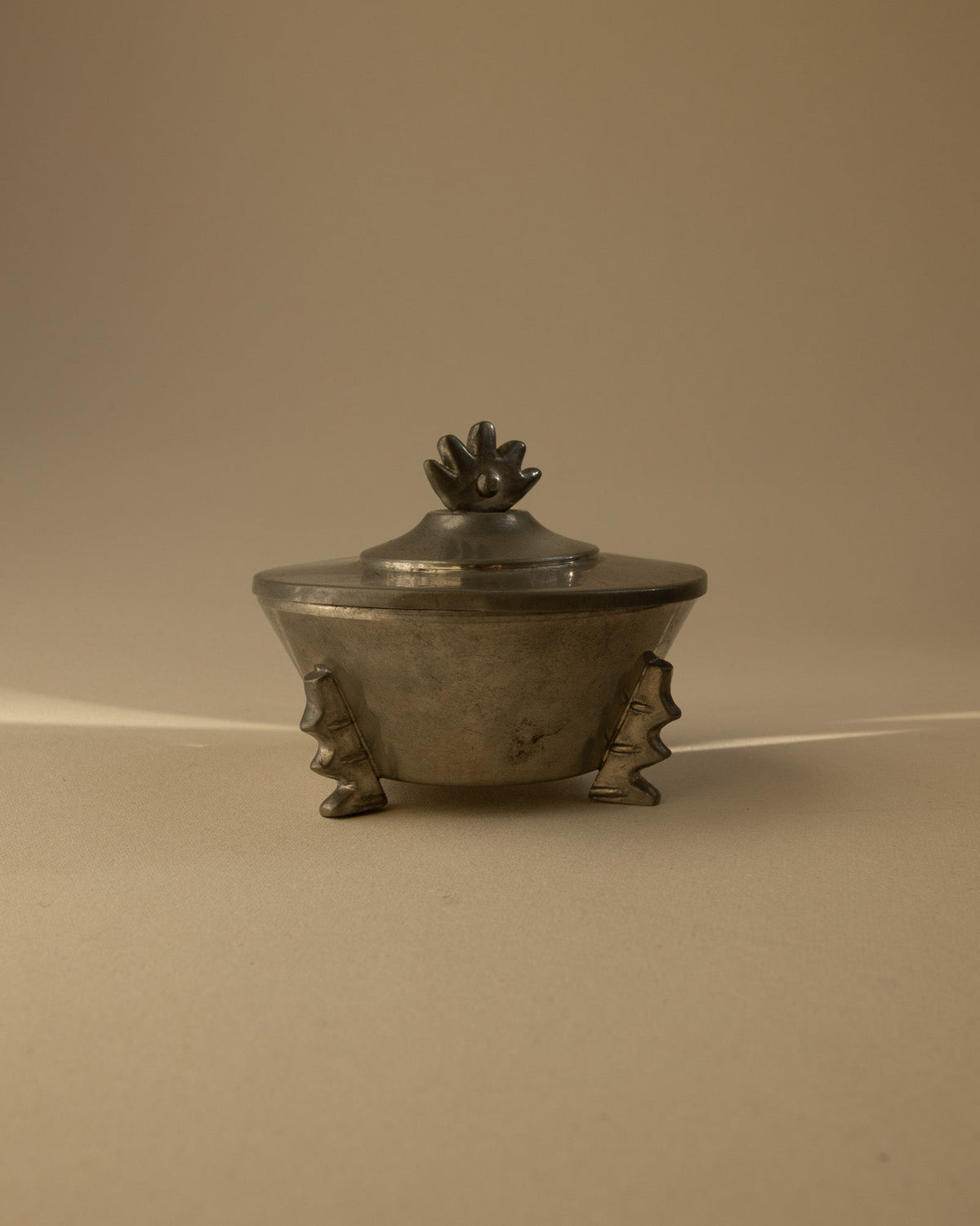 B.H. Edlunds for Svenskt Tenn Swedish Grace Pewter Bonbonnière with Crown Finial (1930) — lifestyle setting