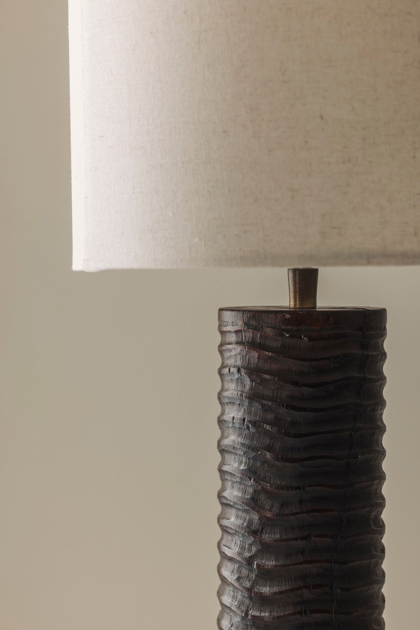 Elegant pair of French wooden carved table lamps from the 1970s. — close-up