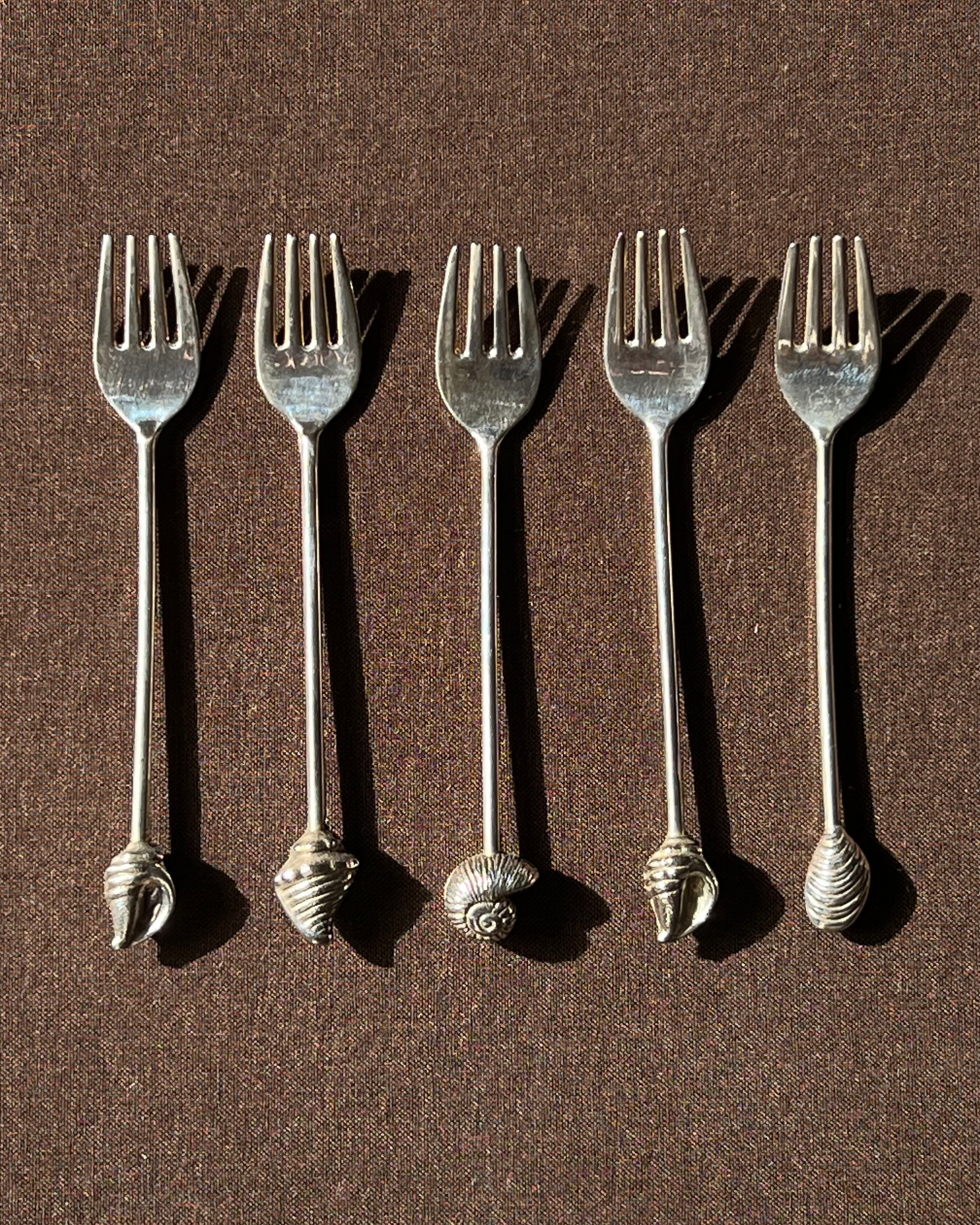 Silver Plated Shell Dessert Forks — side angle