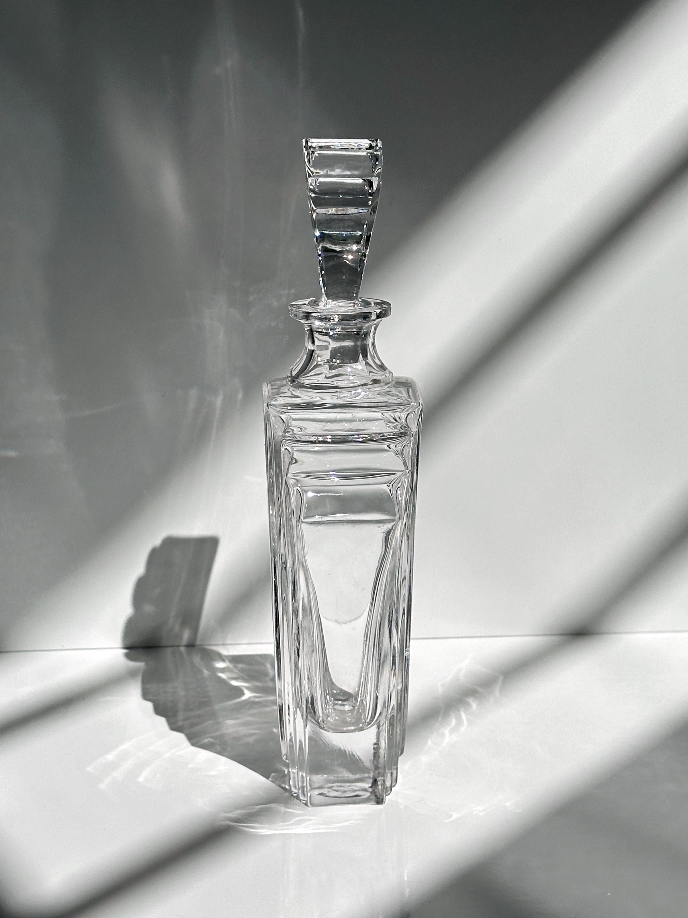 Italian crystal glass Art Deco decanter — top view with light reflections