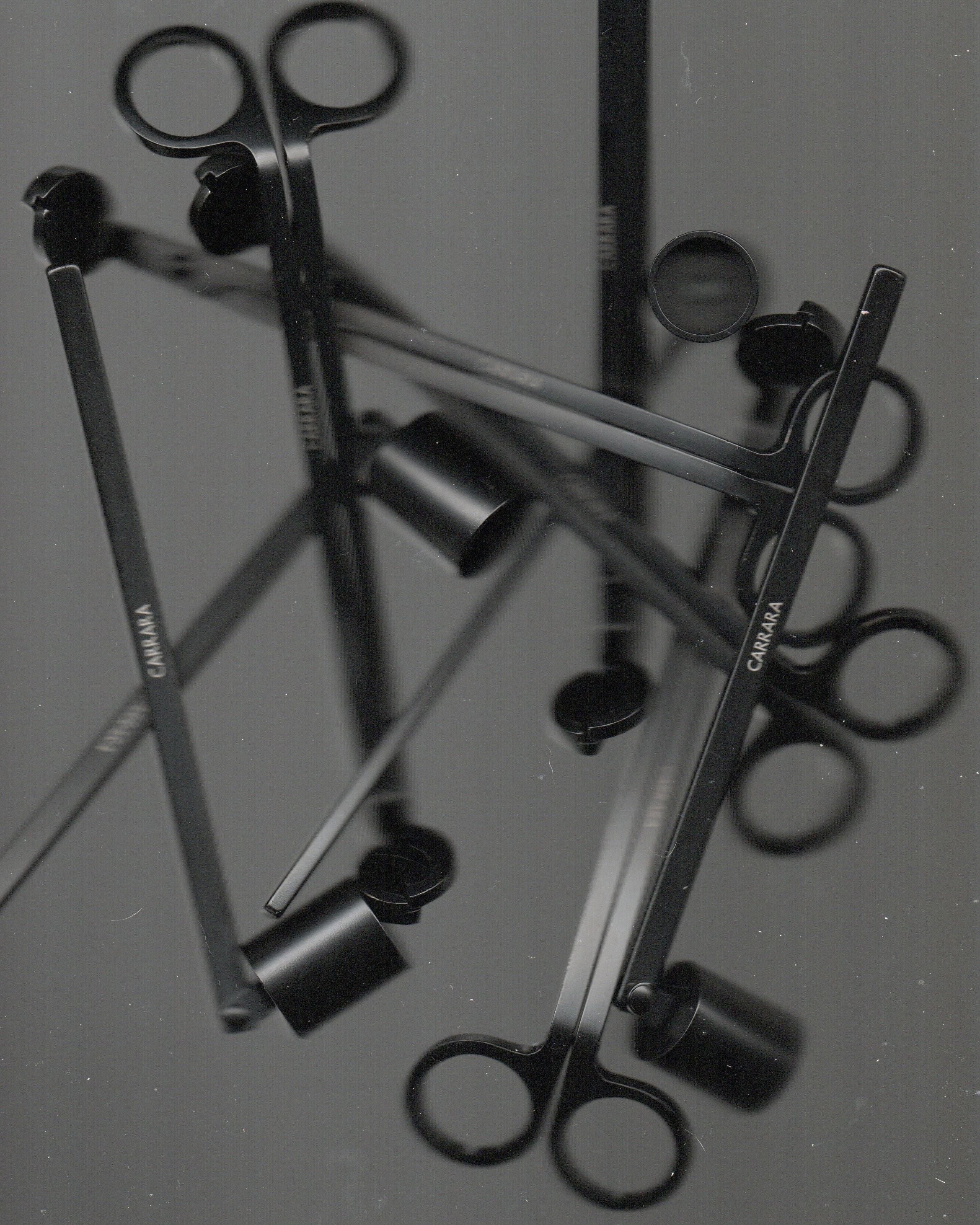 CARRARA' candle care set — top view of black metal tools