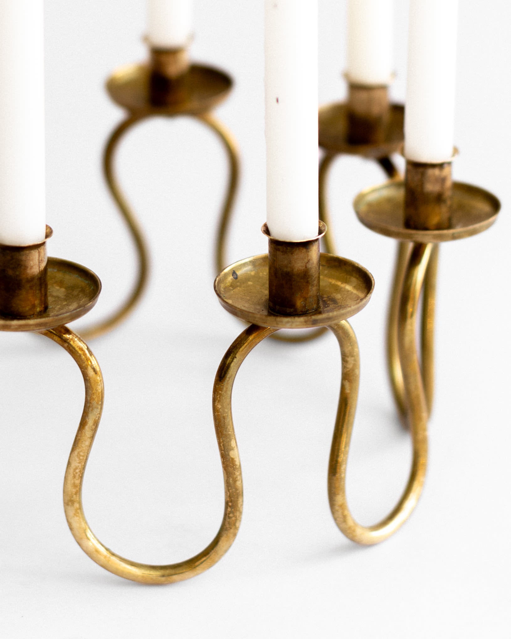 Scandinavian Modern Brass Candlebra by Lars Holmström, 1950s, Sweden — lifestyle setting
