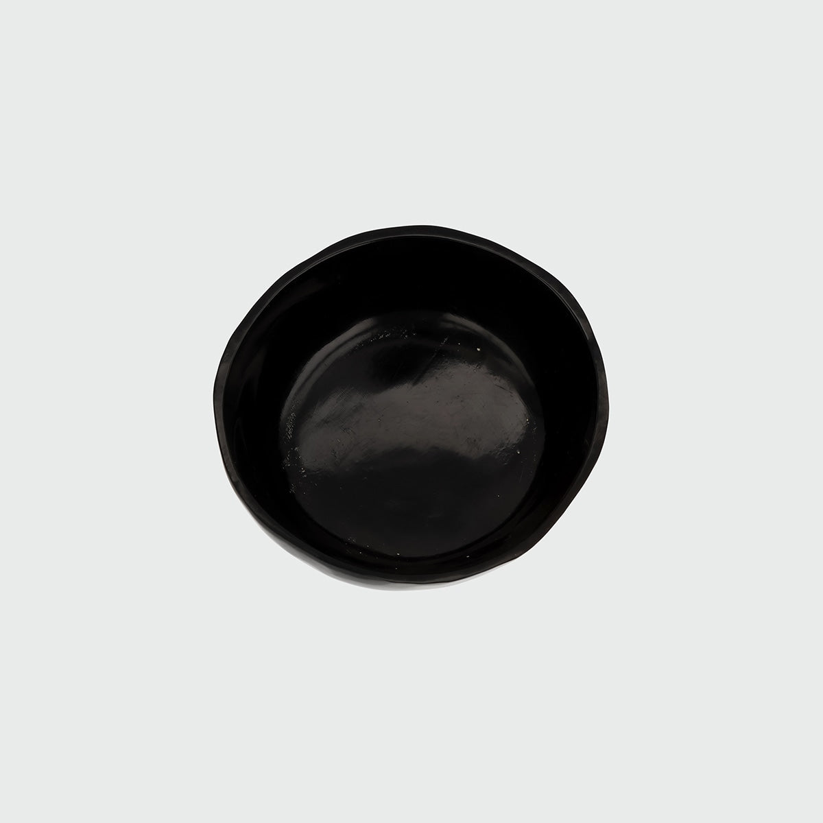 Ossu cup — top view of glossy black ceramic finish