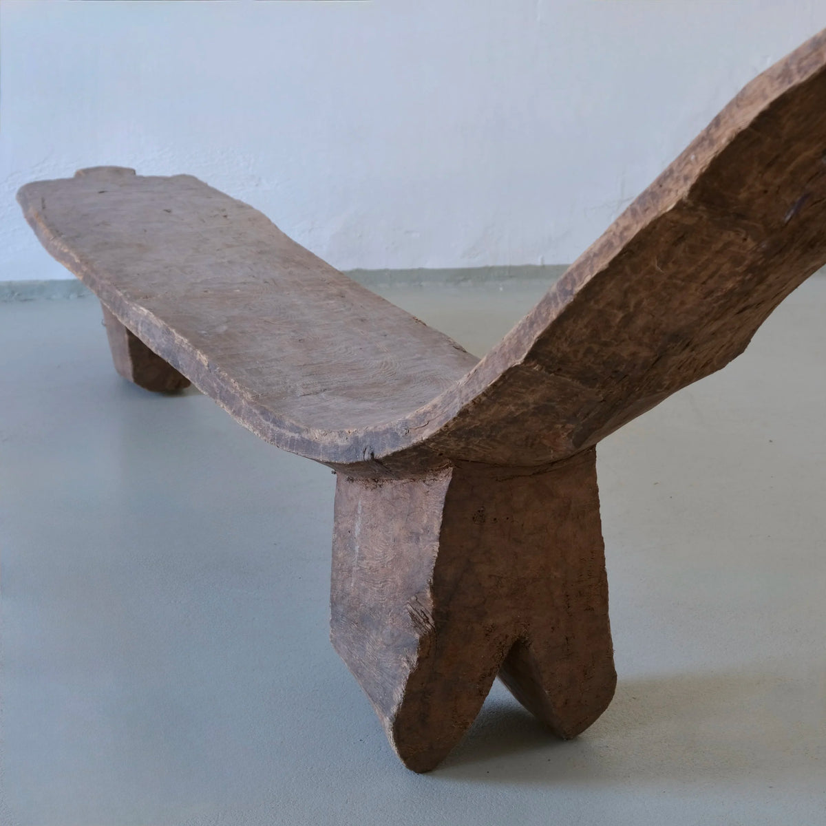 Primitive African Carved Wood Low Sculptural Bench | Vintage — in context