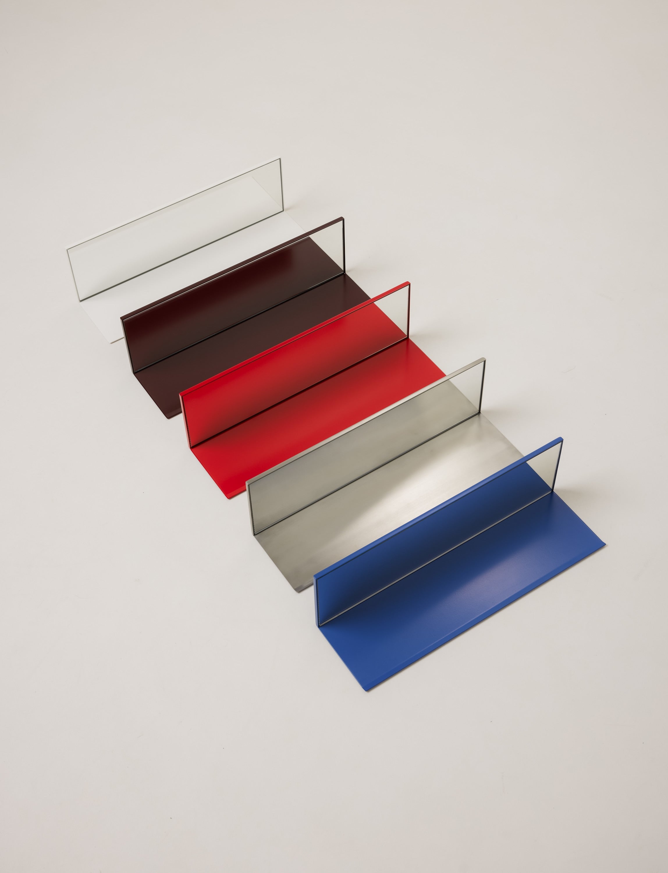 Mirror Steel Shelf — top view of colorful metal shelves
