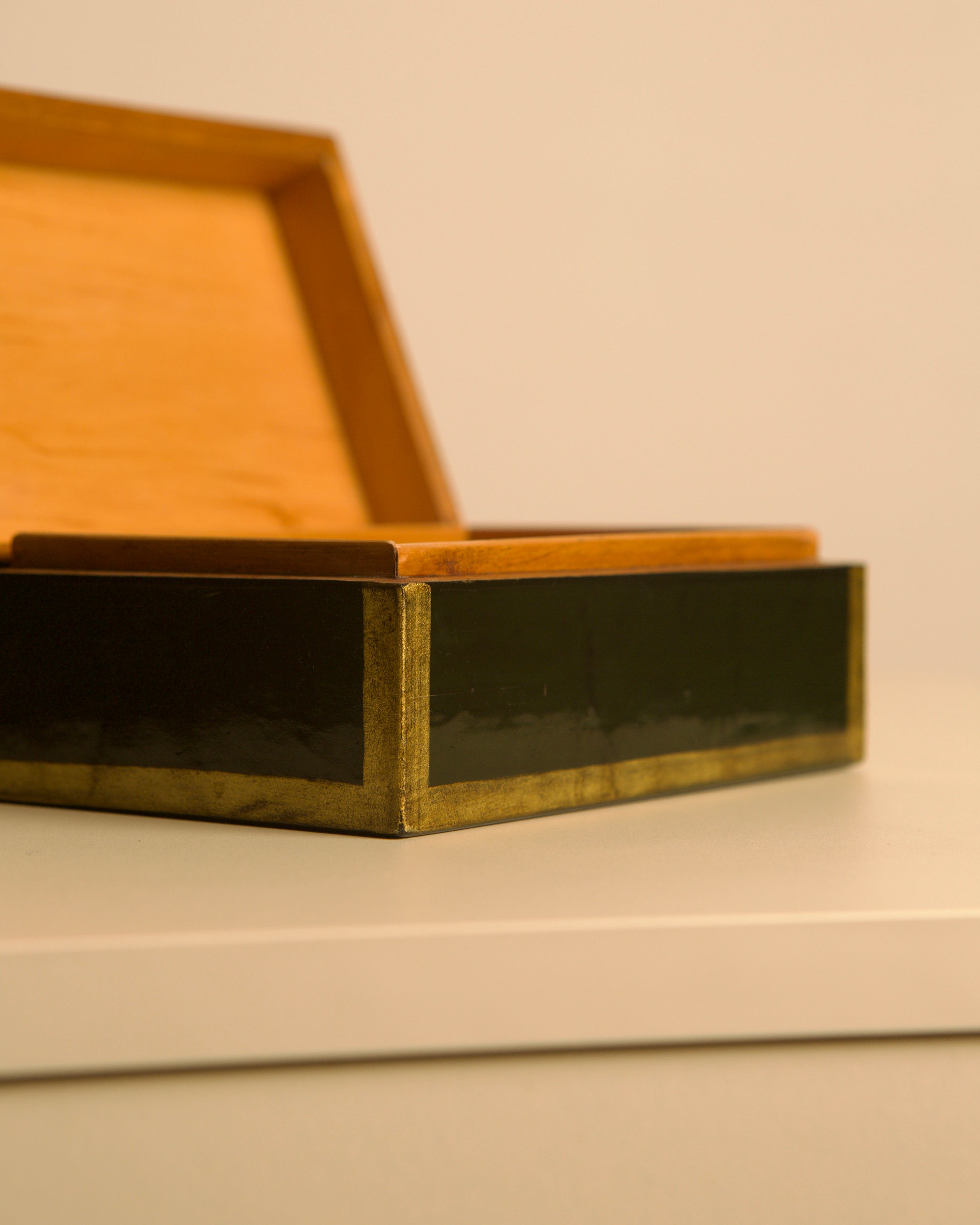 Italian box in Forest Green Lacquered Wood, 80s — side angle showing brass trim and open lid