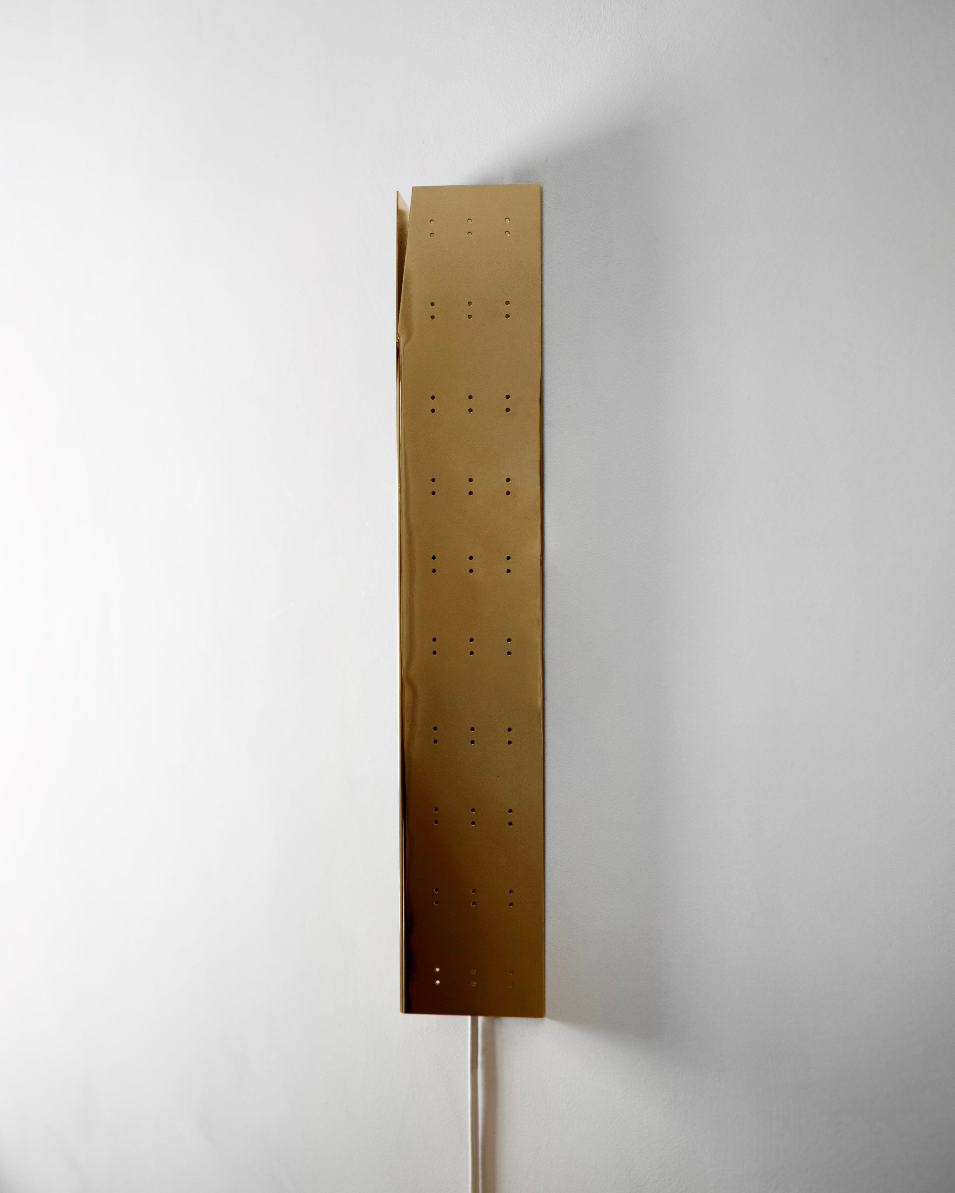 May Wall Lamp - Polished Brass — top view of polished brass surface