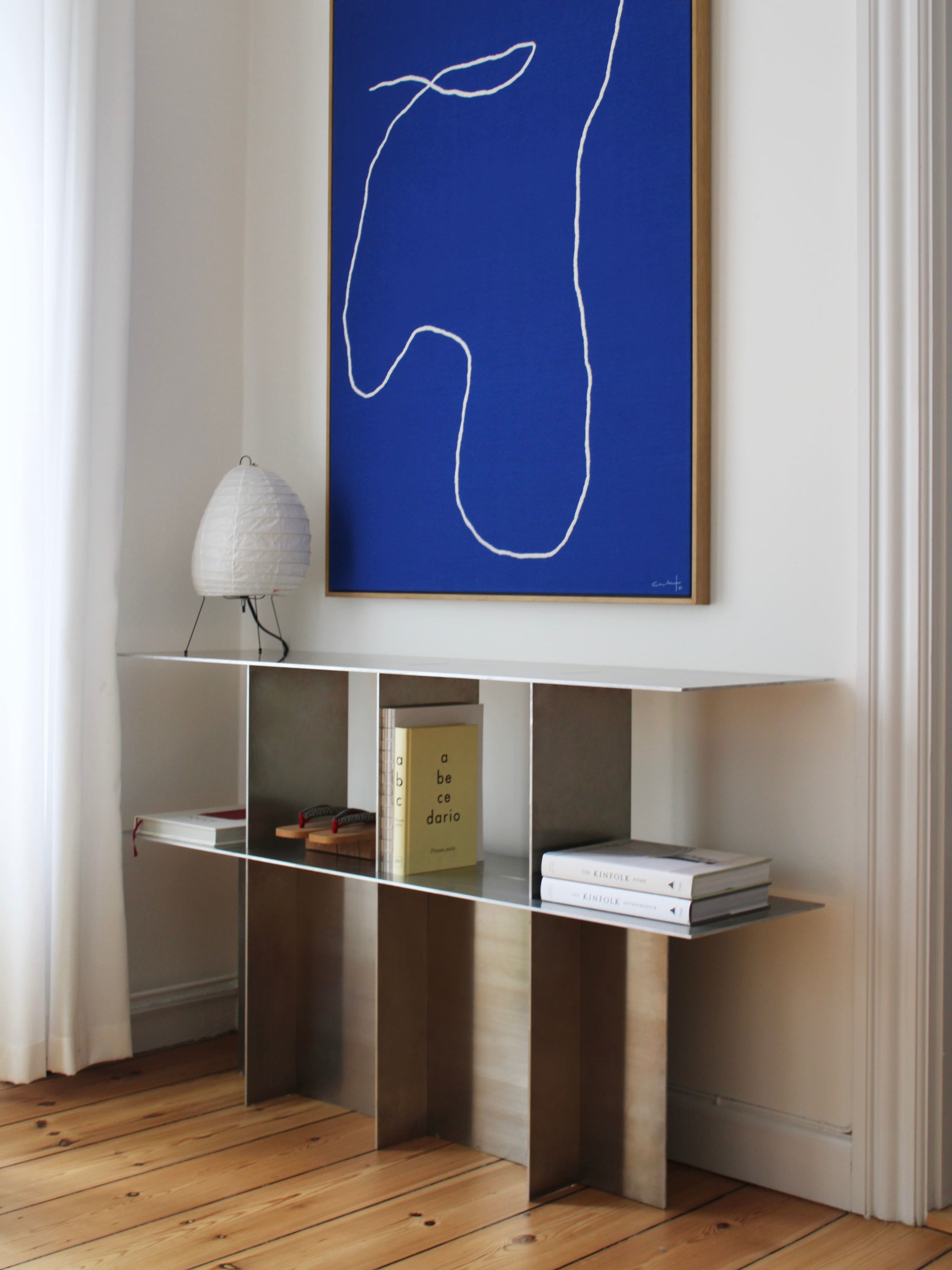 Lamina aluminum console — lifestyle setting