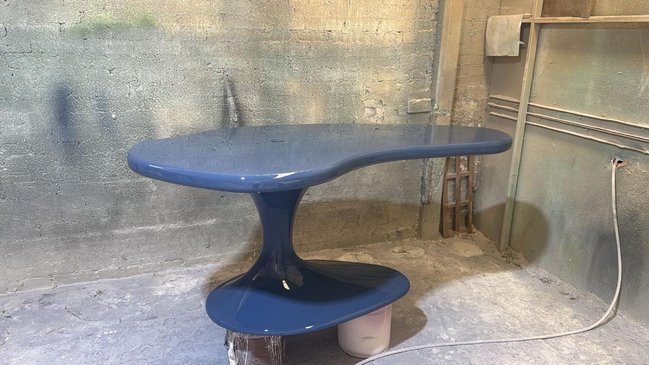 Piano Desk in Lacqued Wood — side view in workshop setting
