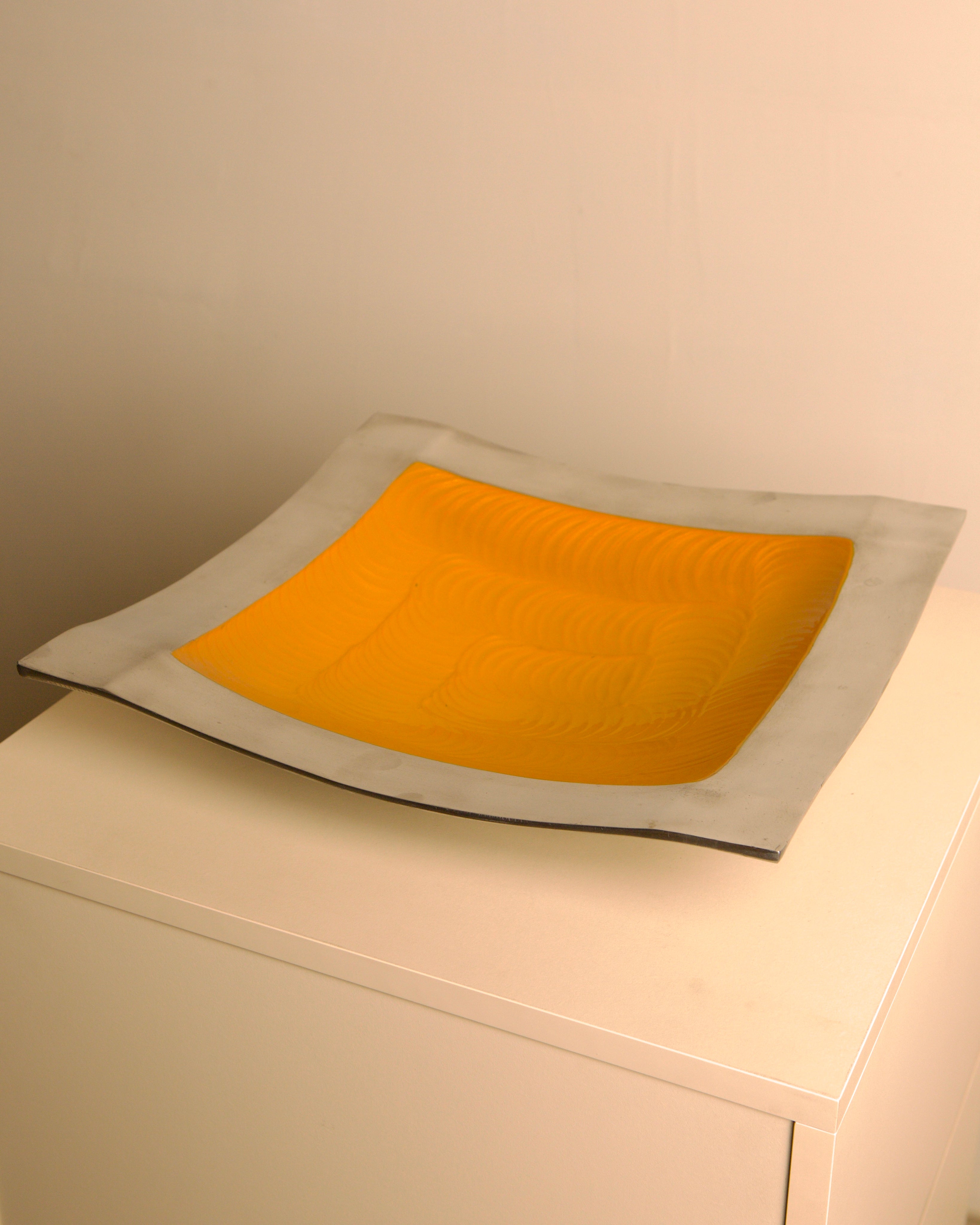 "Galassia" aluminum dish, orange center, Brandani, Italy, 1980s — side angle