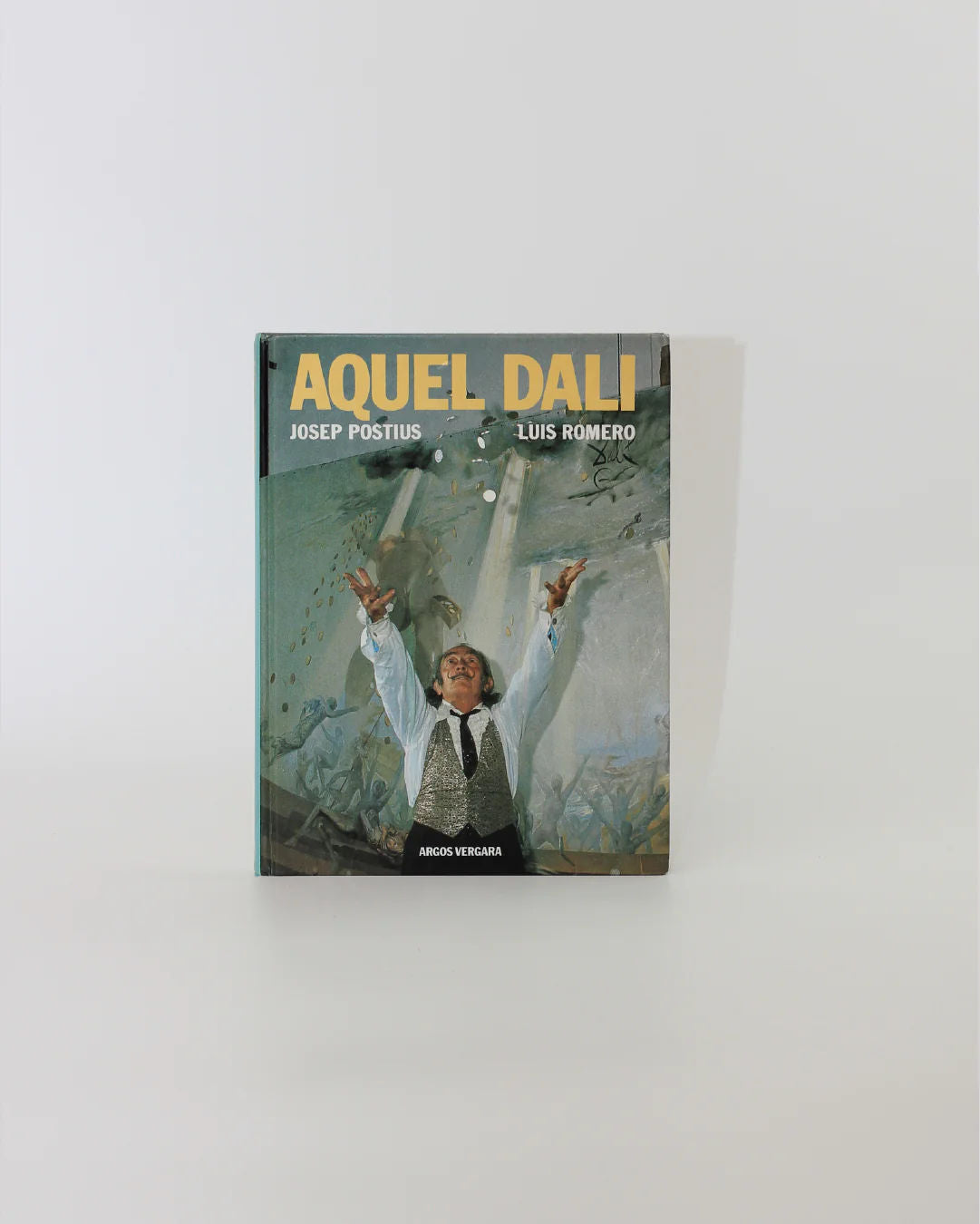 Aquel Dali Book — front cover with colorful artwork on white background