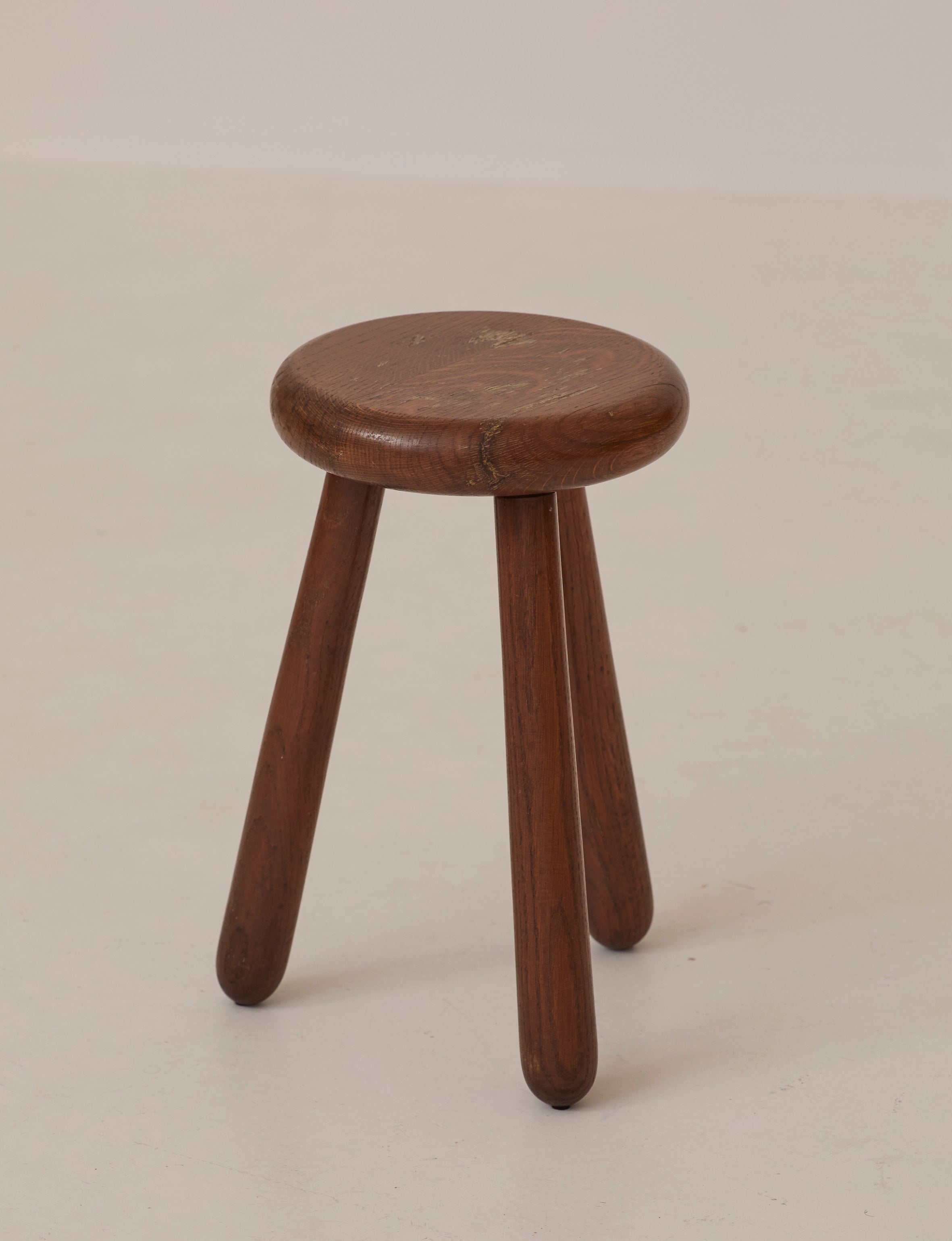 Brutalist Tripod Stool Handcrafted in Solid Oak Wood C. 1960 — angled view on neutral background