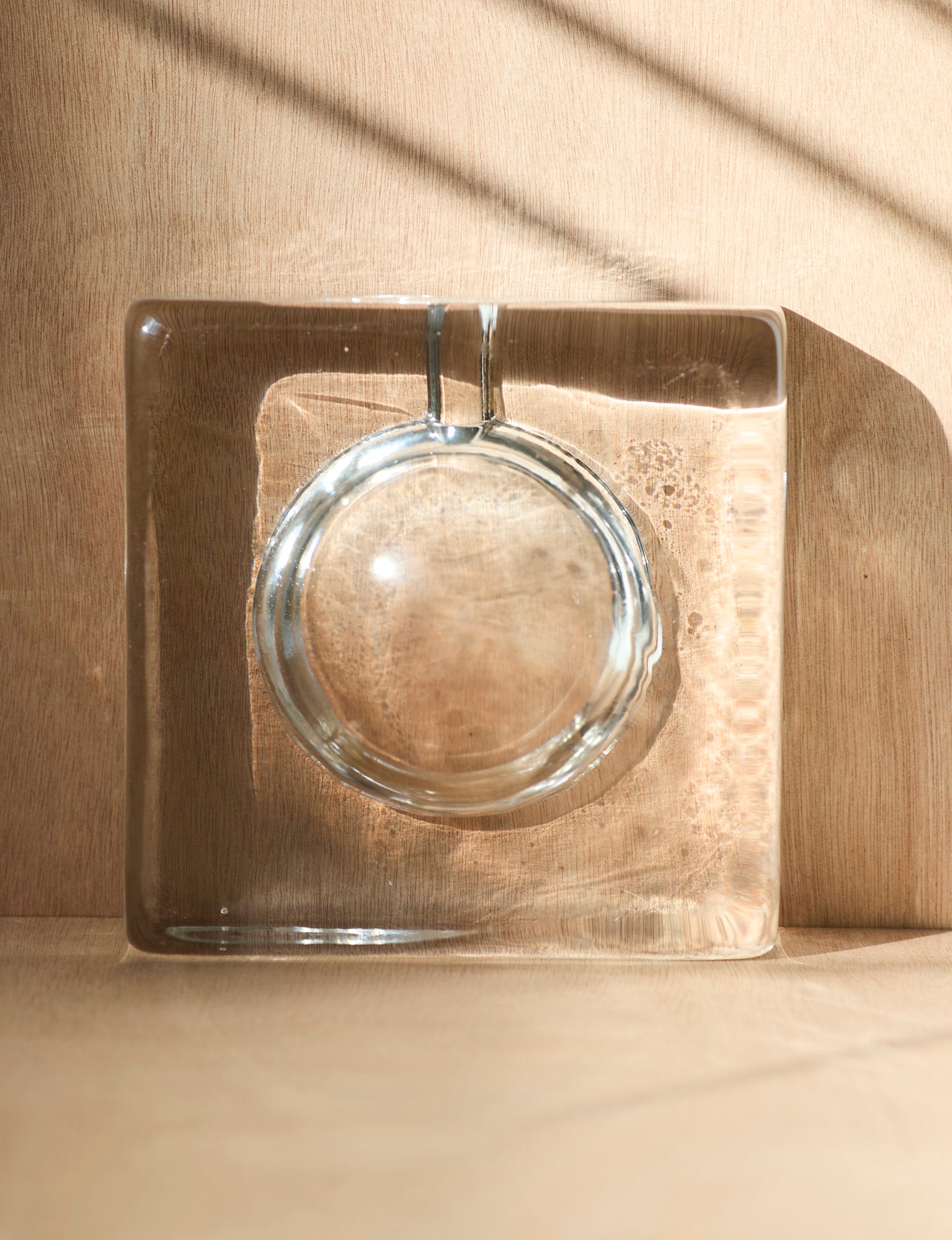 Vintage big and heavy mold-pressed glass ashtray c. 1970. — side angle