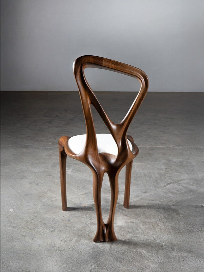 Gazelle Chair in Walnut Wood — back view highlighting sculptural wooden design