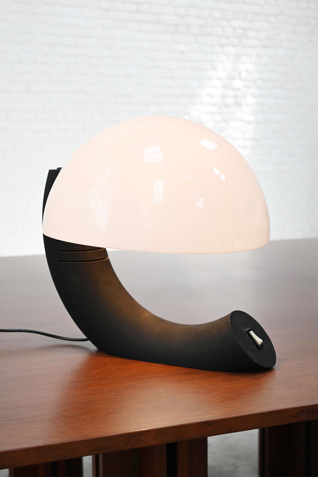 Italian Concordia table lamp curved black base glowing white shade