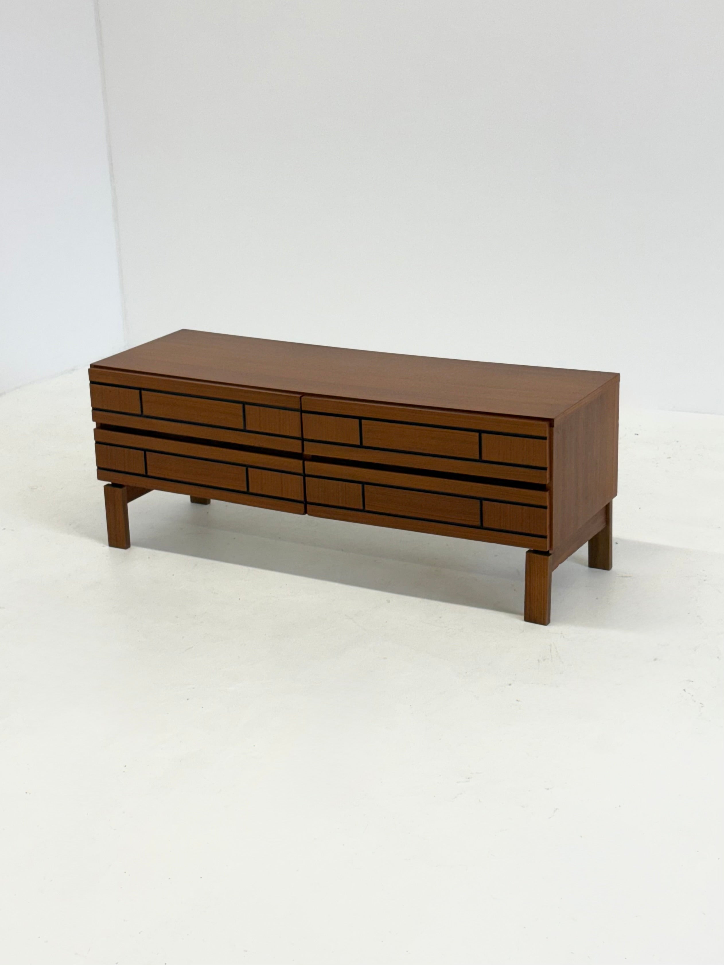 Low Italian wooden sideboard with graphic black lines — side angle