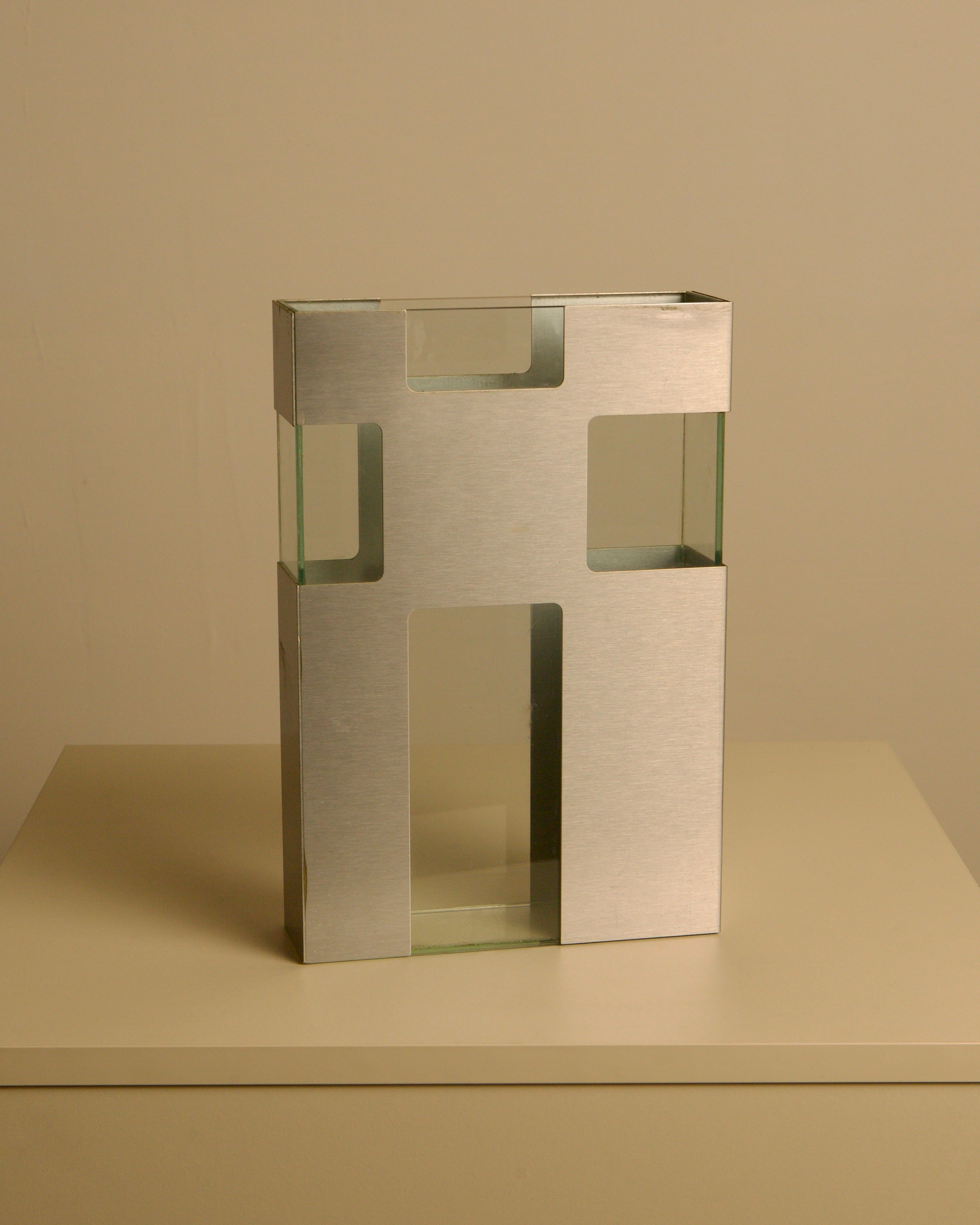 Italian Vase in Metal and Glass c. 1980 — close-up of brushed metal and glass details