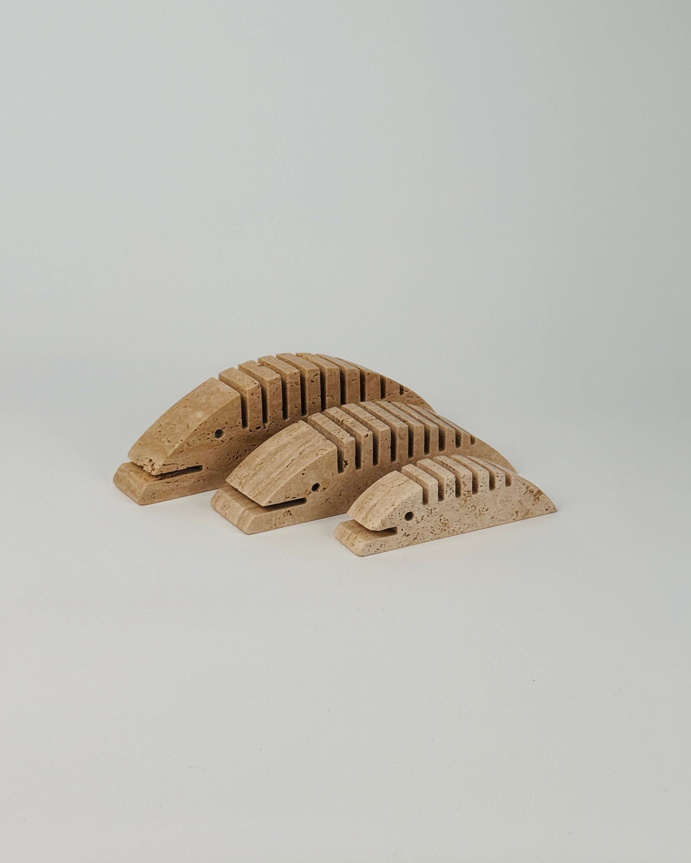 Set of 3 travertine Sculptures by Fratelli Mannelli — side view highlighting textured surfaces
