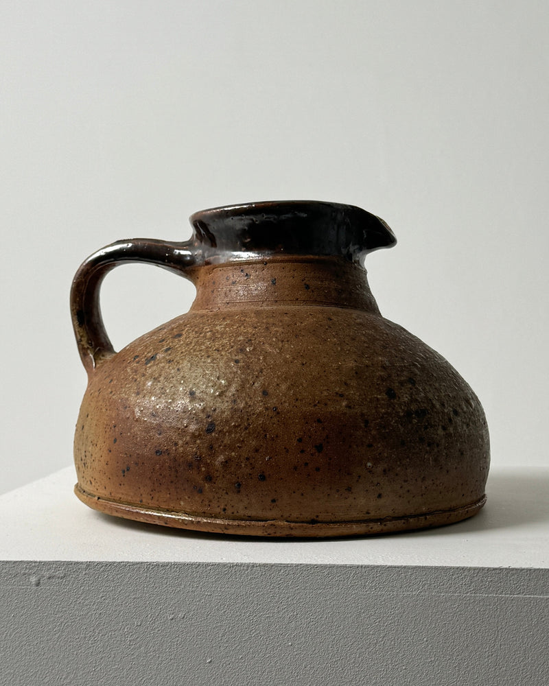 Large ceramic pitcher with brown speckled glaze by Pierre Digan