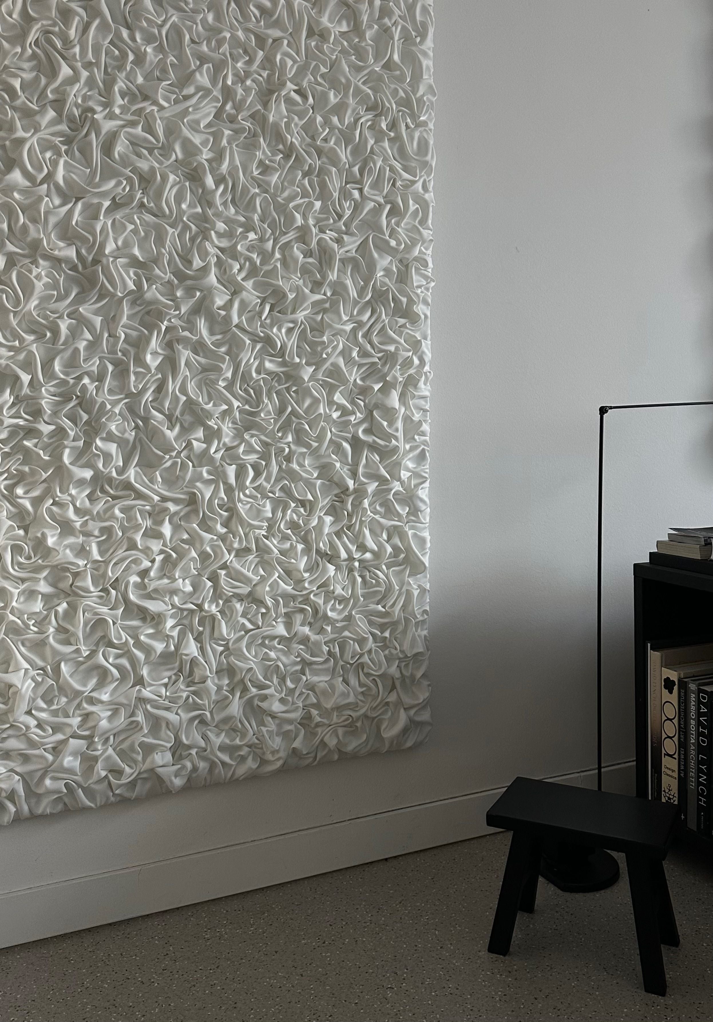 ESCAPISM 108' sculptural wall art — close-up of textured white fabric detail