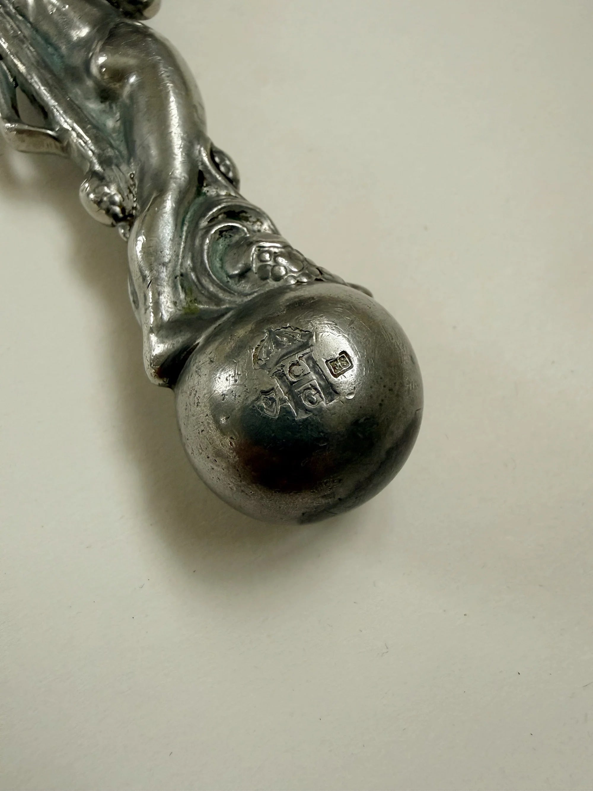CG Hallberg Hand Mirror in Pewter, Swedish Grace, 1933 — close-up of ornate handle detail