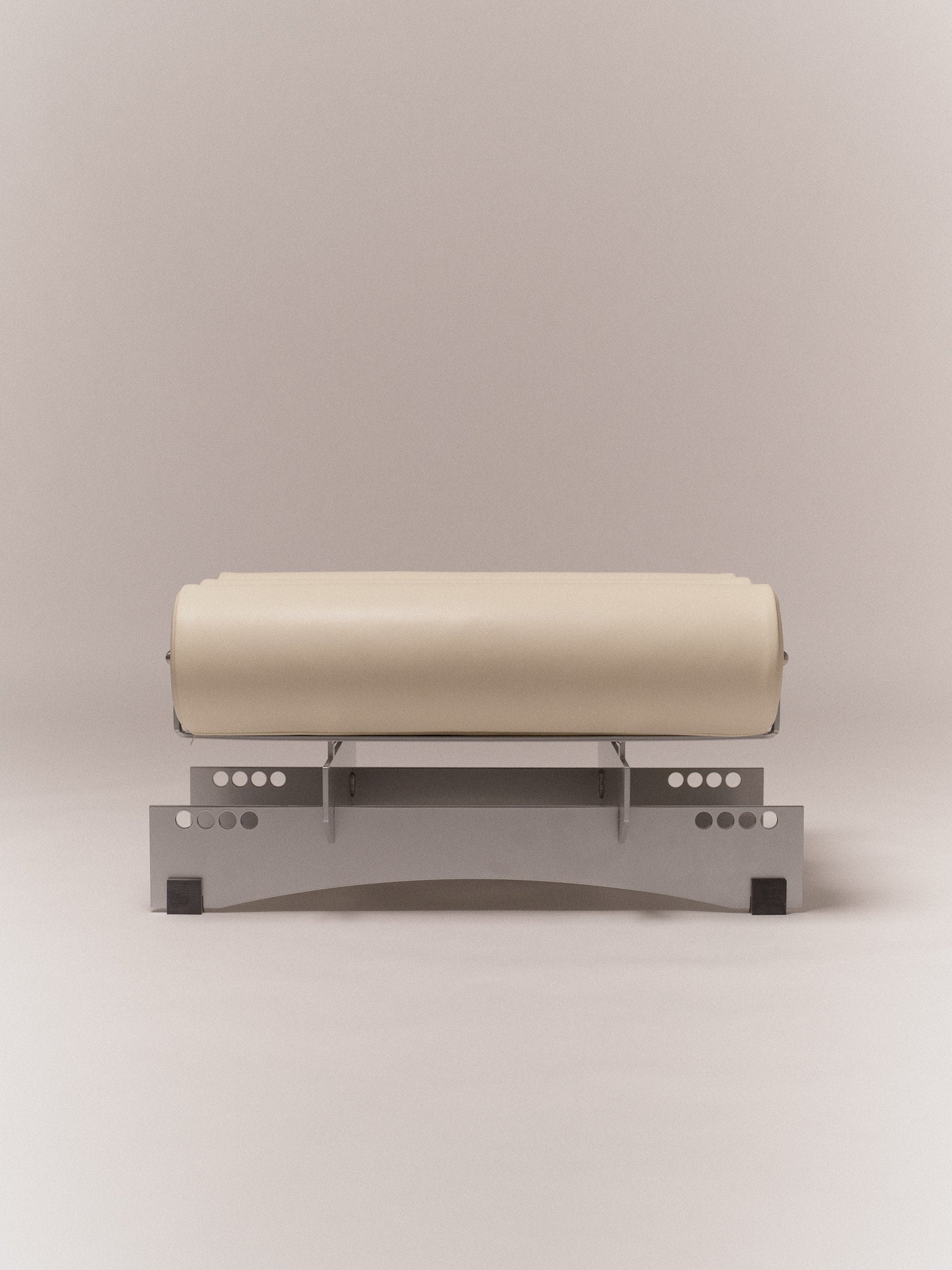 Ottoman Bassa — side angle view of cream upholstered seat on gray base