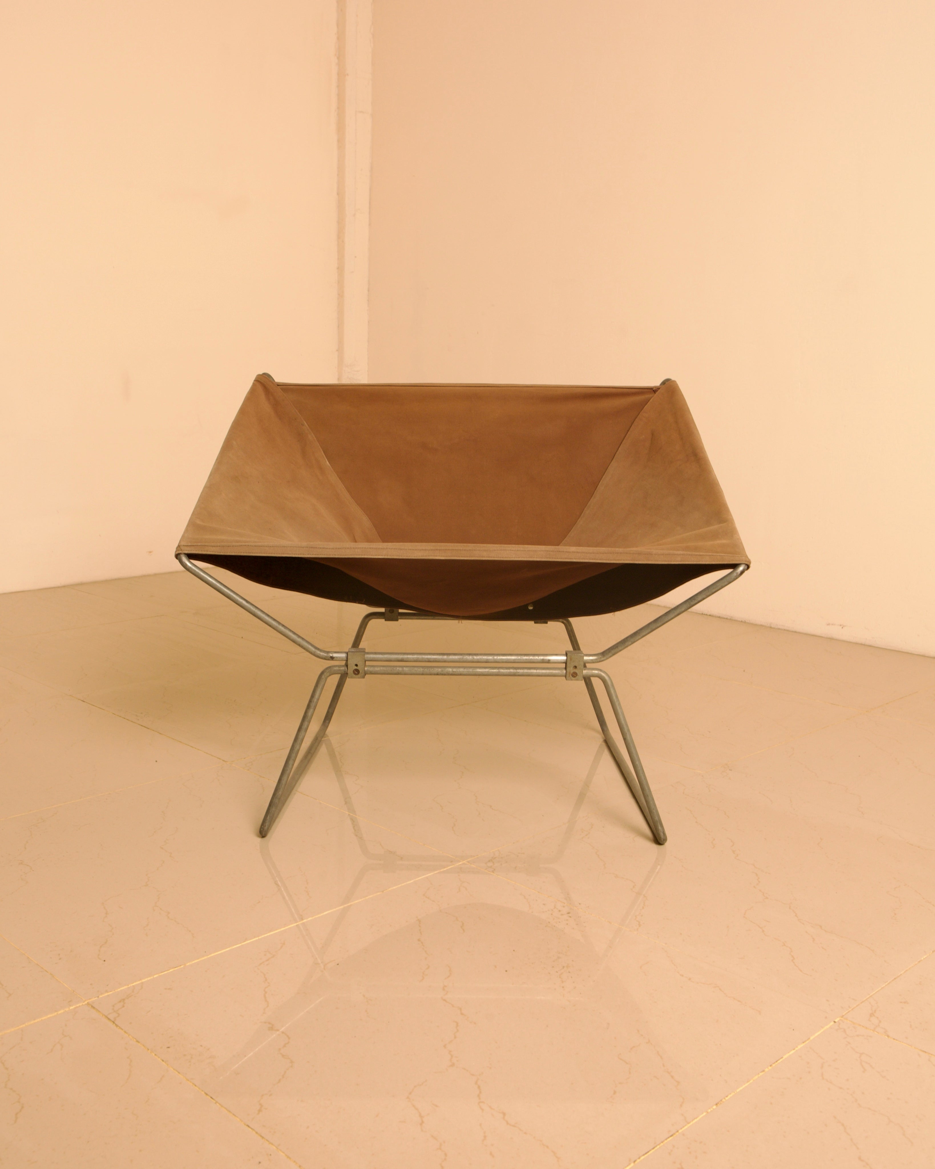 AP-14 Armchair in Canvas by Pierre Paulin for AP Polak, 1950s — front view highlighting brown canvas and metal frame