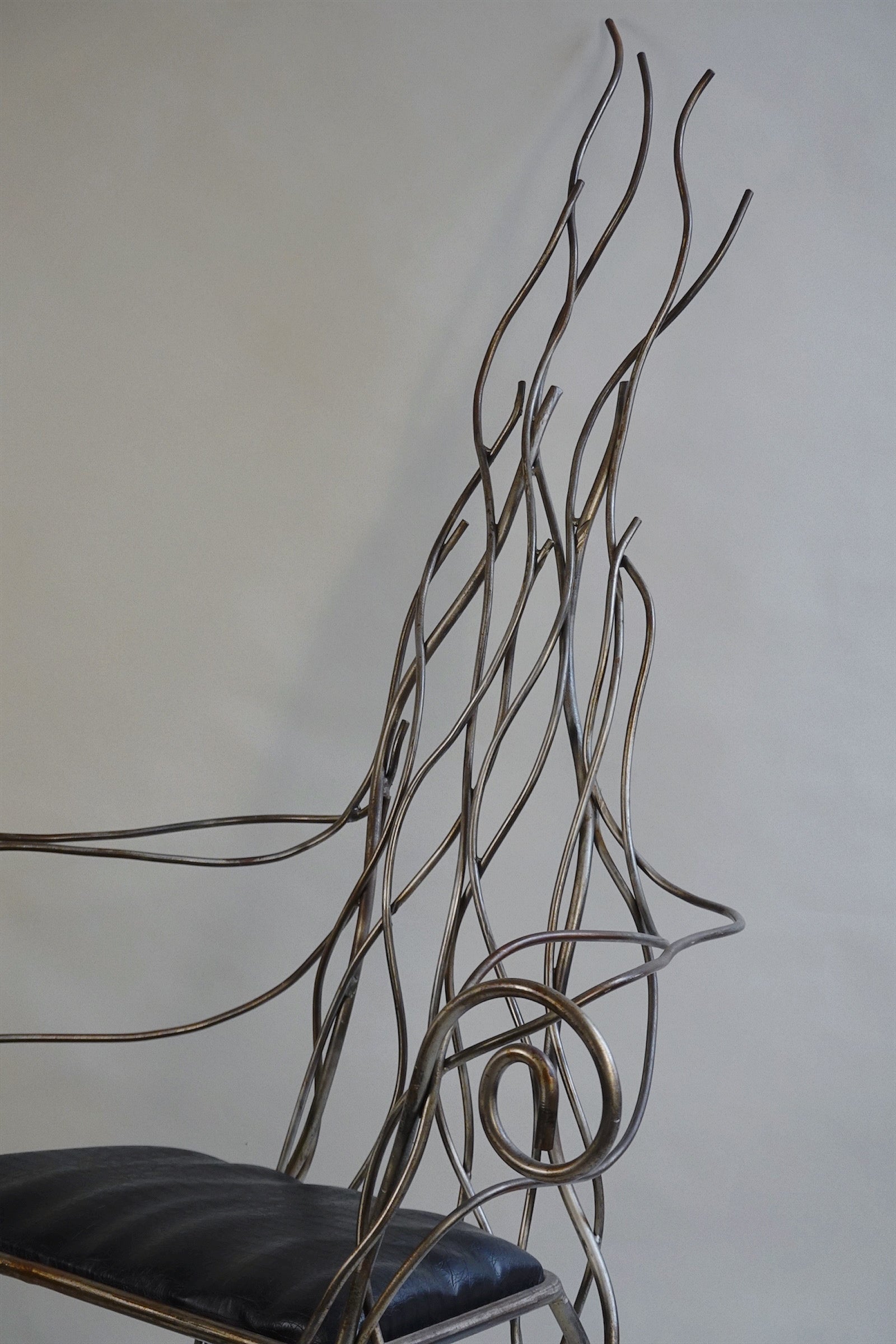 Iron High Back Chair in the manner of André Dubreuil c.1990's — side angle