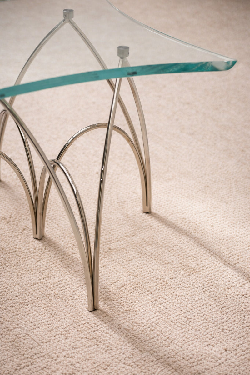 ARCH Side Table - Clear Glass — close-up of chrome legs and glass top