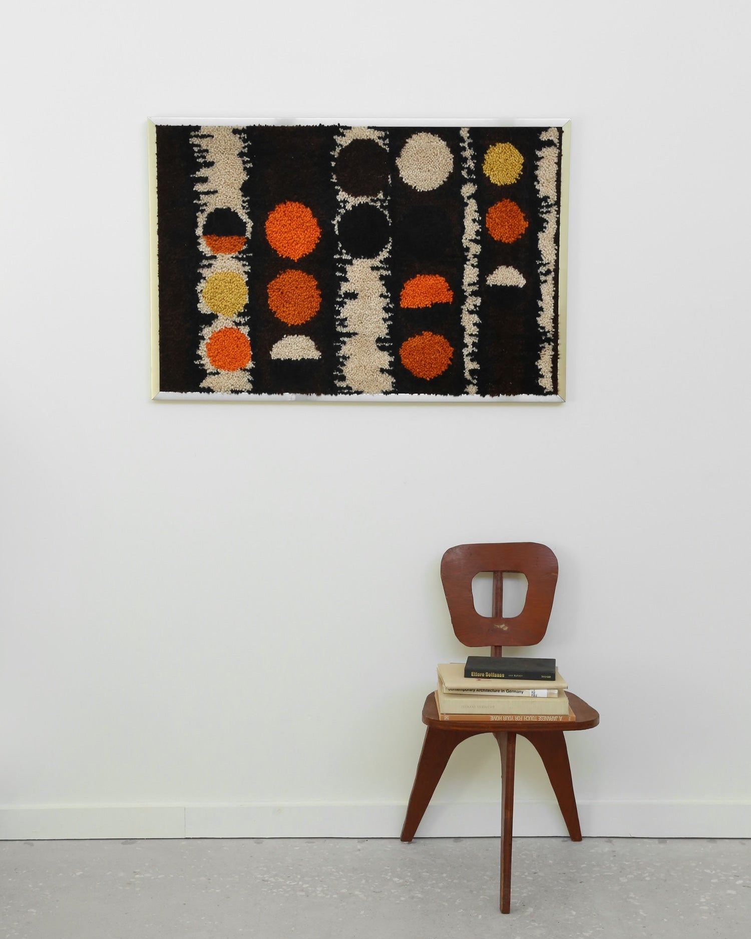 Scandinavian Textile Framed Art — detail of colorful textile on wall