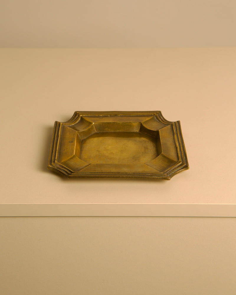 Italian "Octagonal" Brass Trinket Tray, 1960s — close-up of brass surface on neutral background
