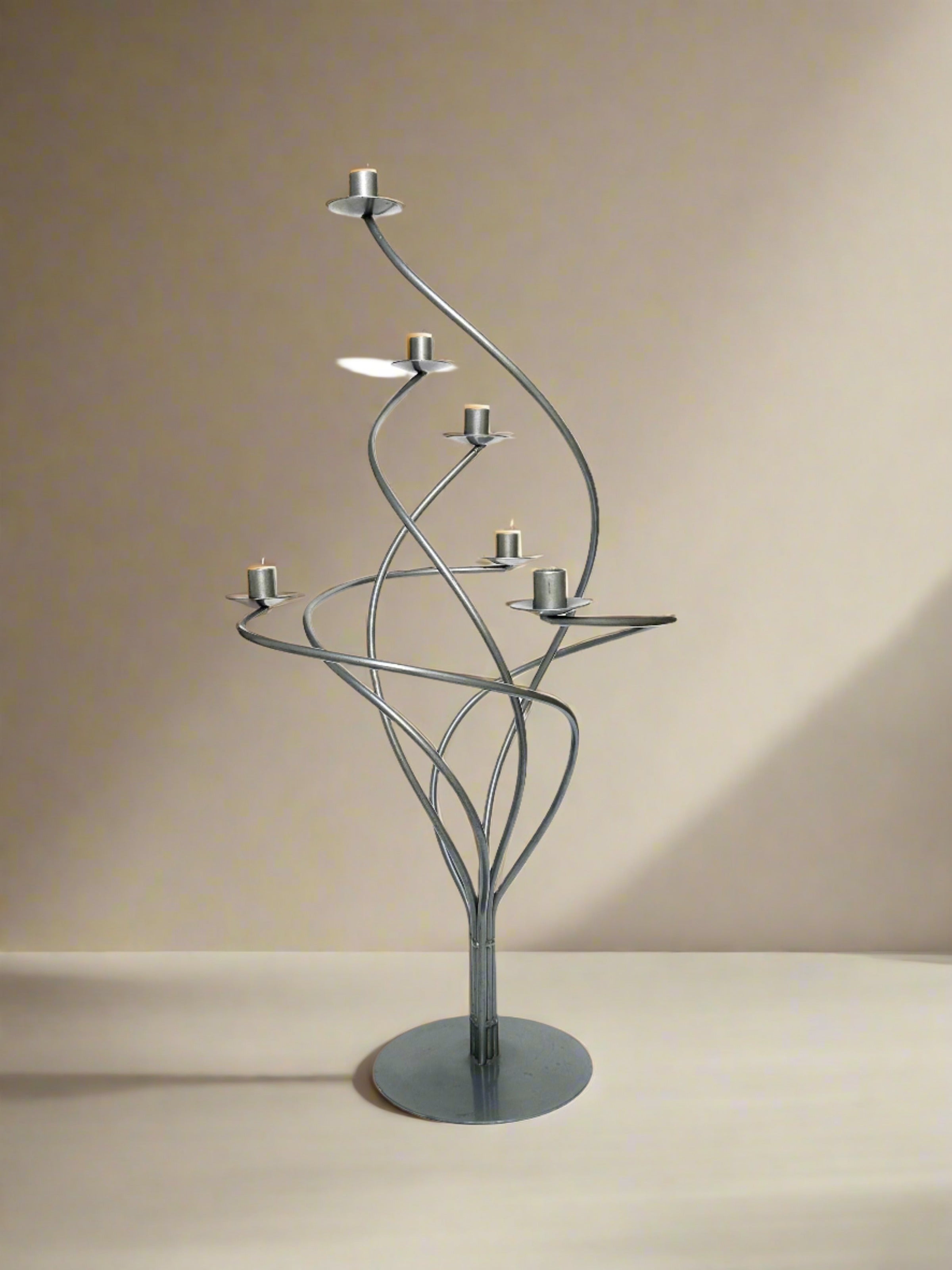 Large Spiral metal Candelabra — standing in neutral-toned interior setting