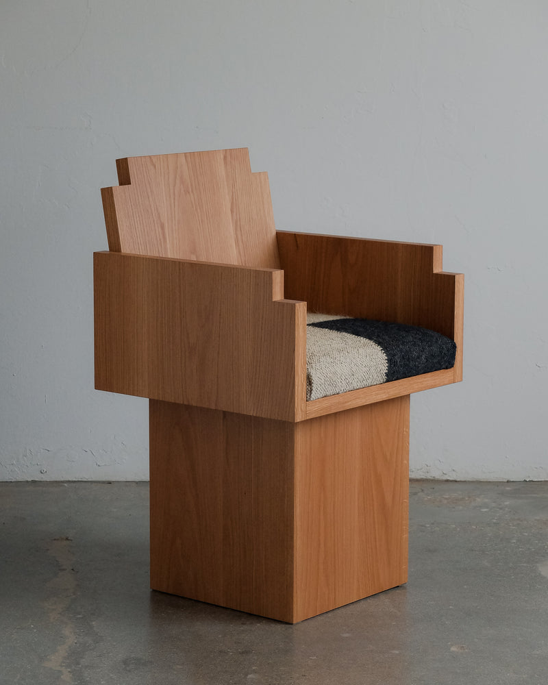 Frankie Chair — angled view highlighting wooden structure and fabric seat