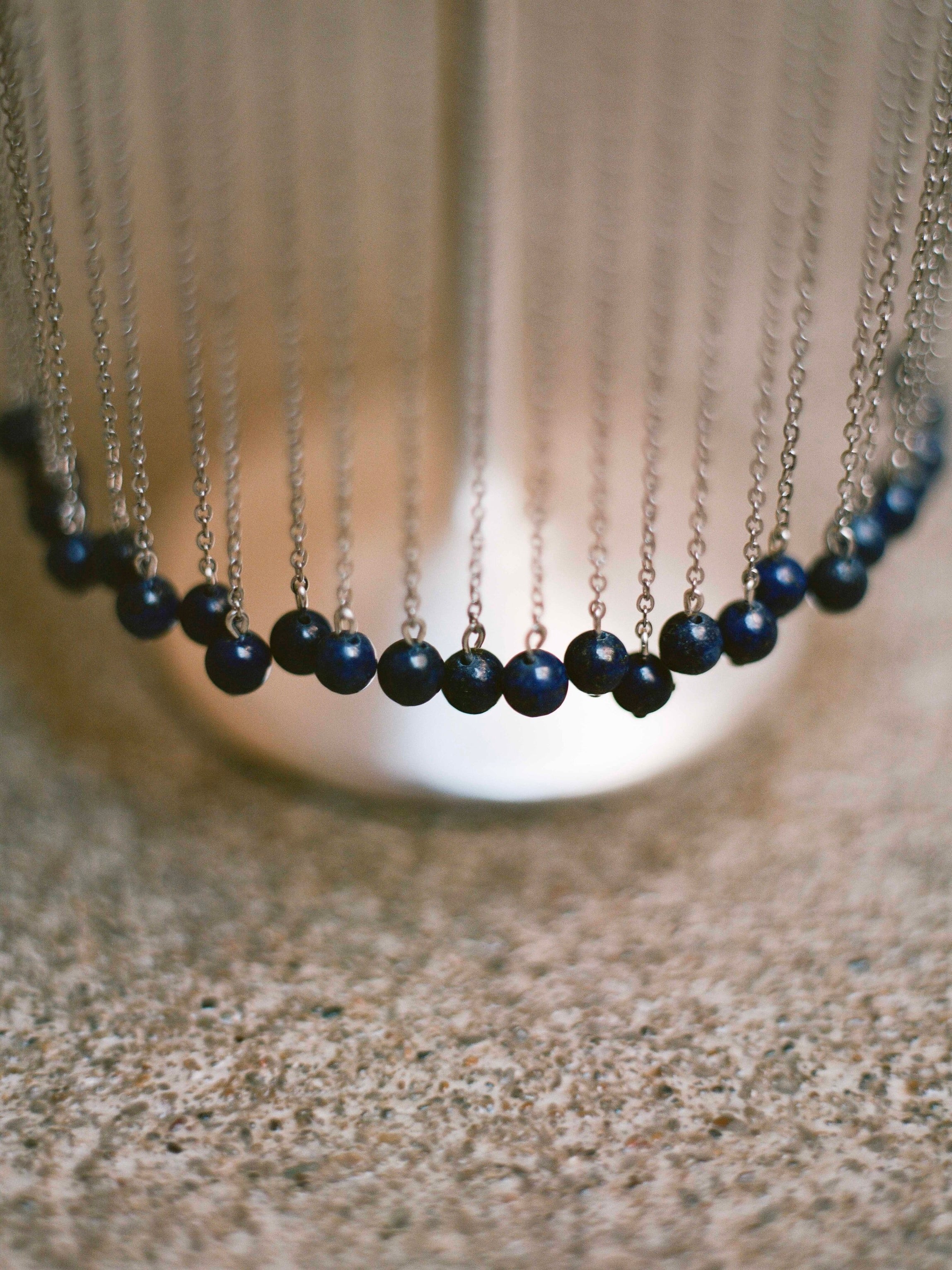 CELEBRATION GLASS X TALLER MARMO — top view of blue bead detail