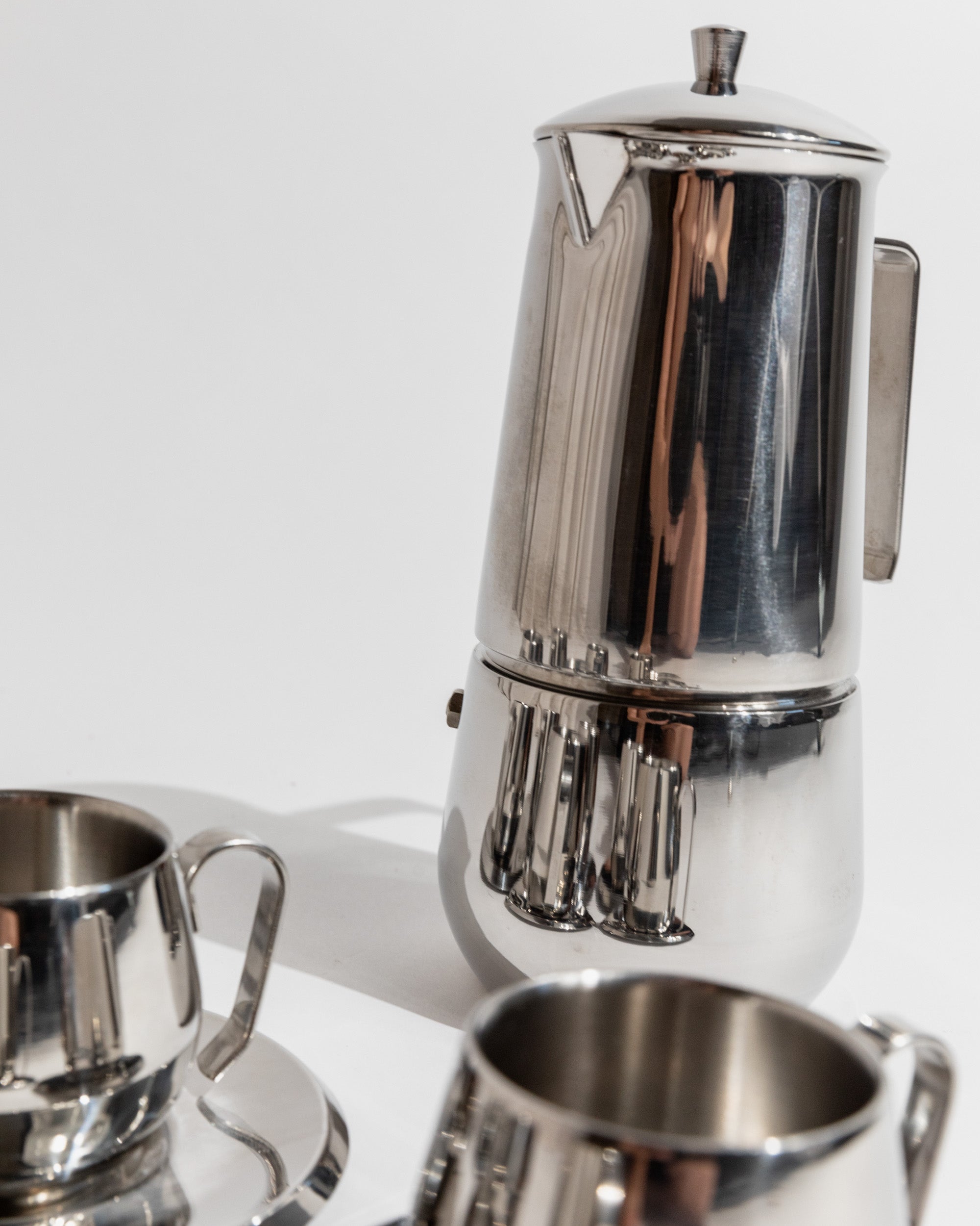Elegant Vintage Coffee Set, 13 Pieces, Stainless Steel, Design by Gnutti Italy 1980s, Gift — back view of coffee pot with cup