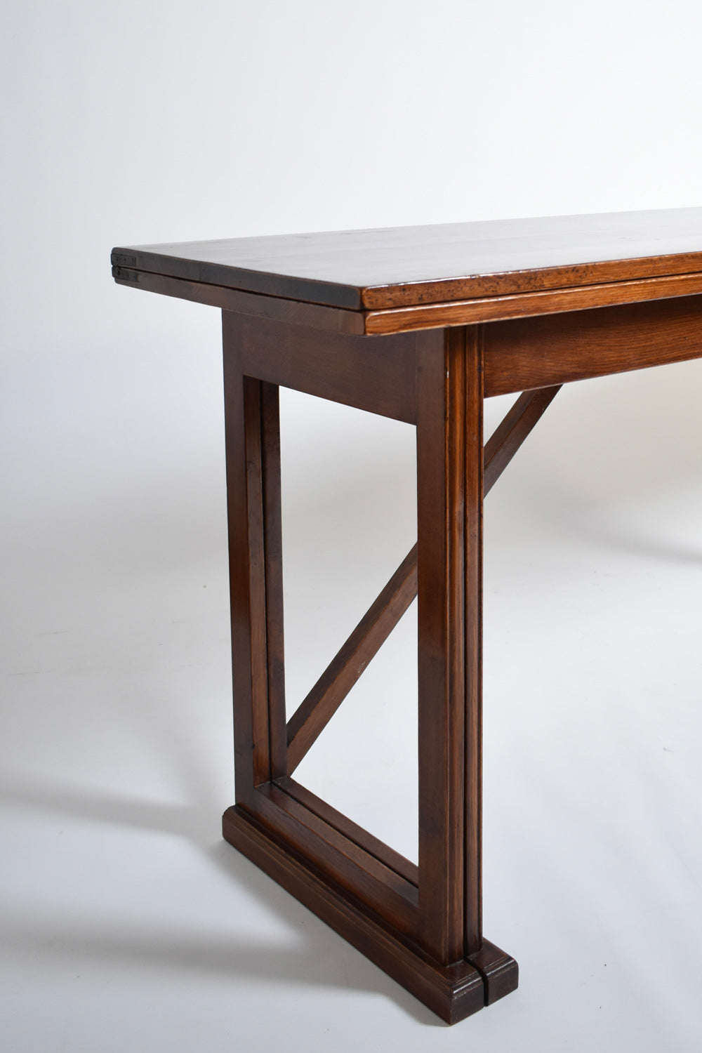 Folding wooden console, 1950s — top view of rich brown wood finish