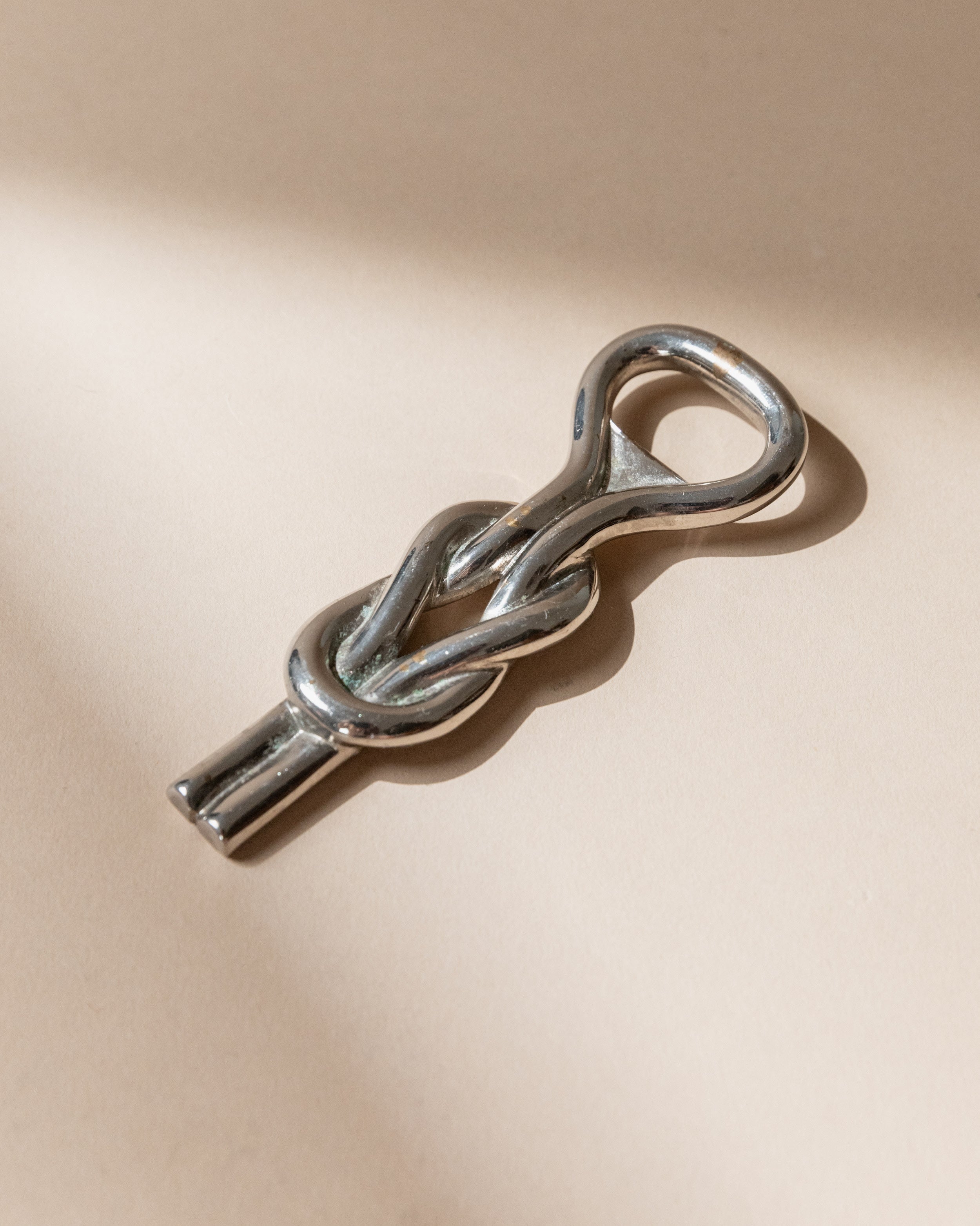 Ouvre-bouteille plaqué argent, Italie, années 1960