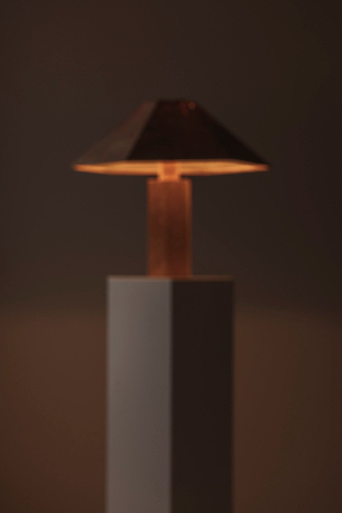 Hexagonal Cork Table Lamp by Ingo Maurer for M Design, Germany 1970s — illuminated view against dark background