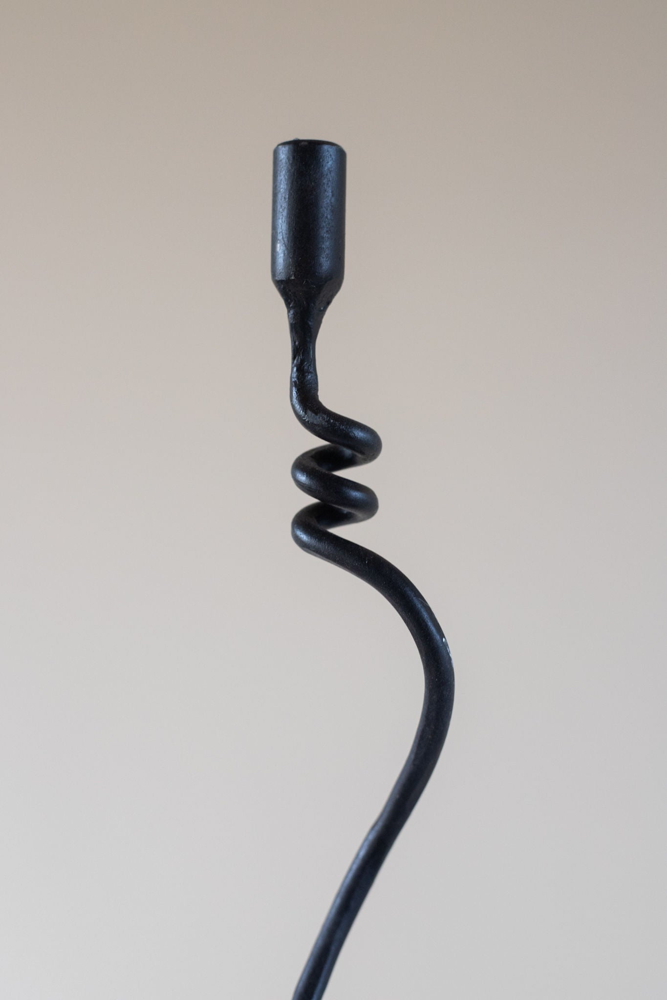 Jasmine Candleholders — close-up of black metal spiral design